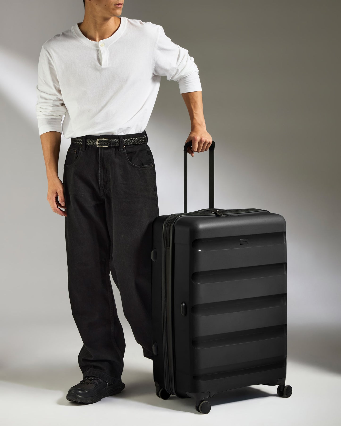 Large Suitcase in Black - Logo Stripe