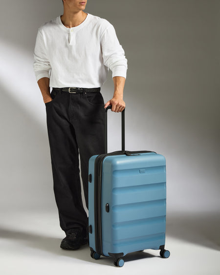 Medium Suitcase in Light Blue - Logo Stripe