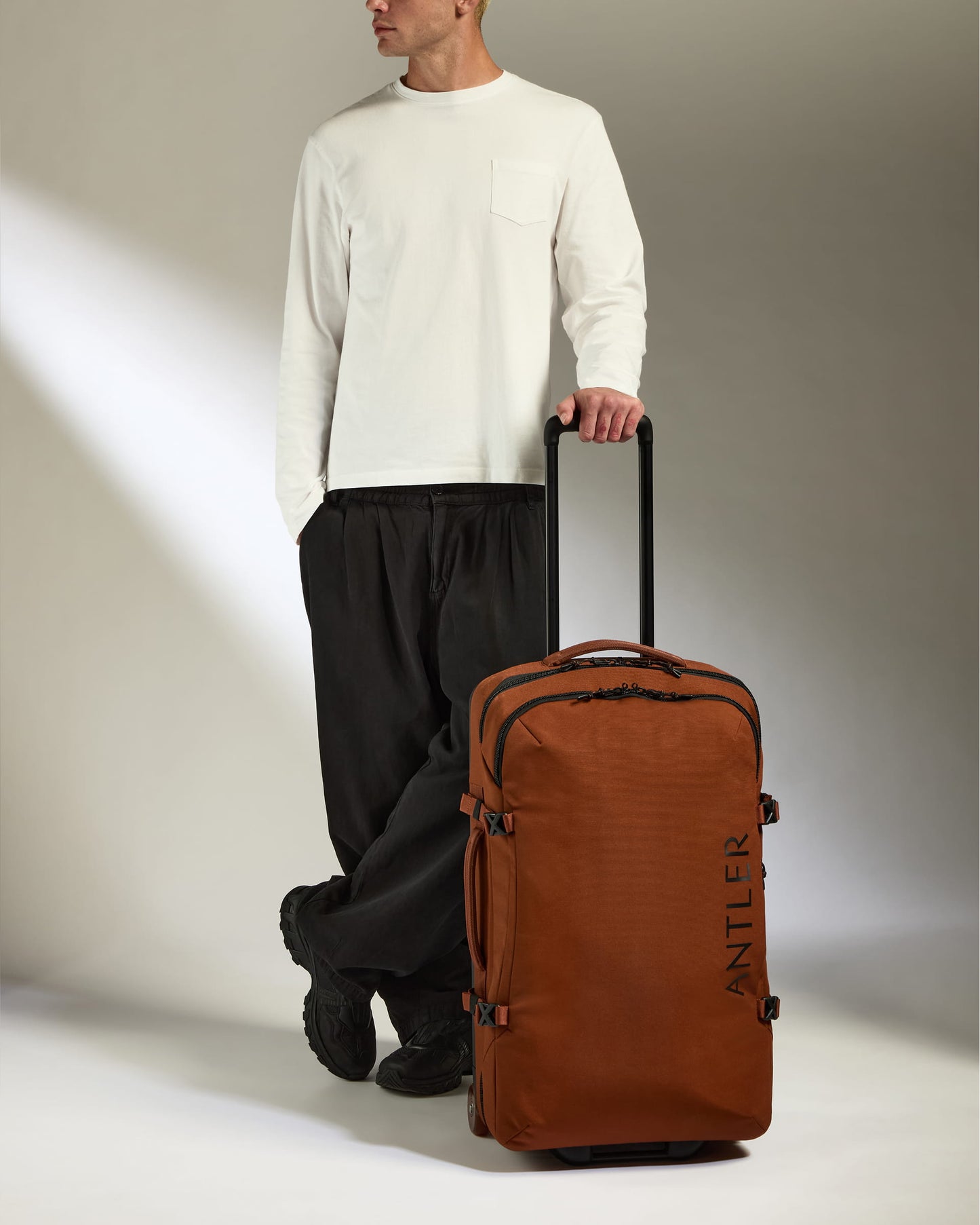 Discovery Wheeled Duffel in Clay Brown