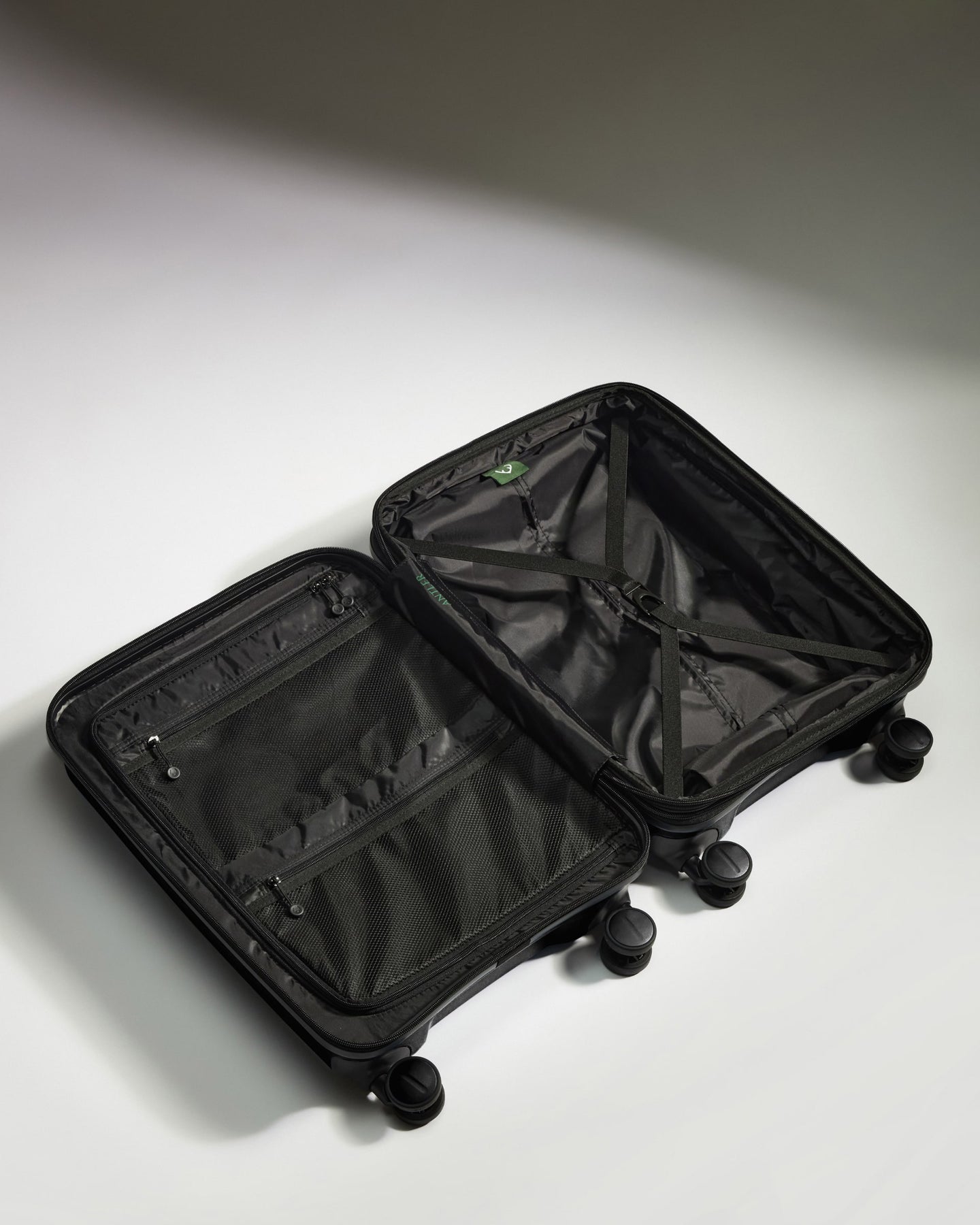 Expandable Cabin Suitcase in Black - Logo Stripe