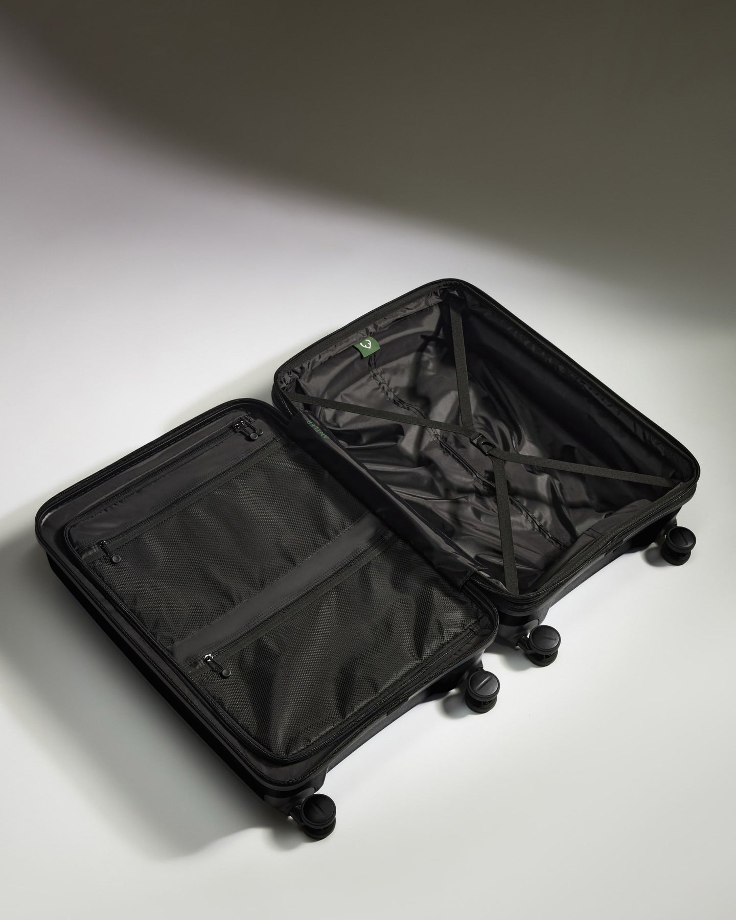 Medium Suitcase in Black - Logo Stripe