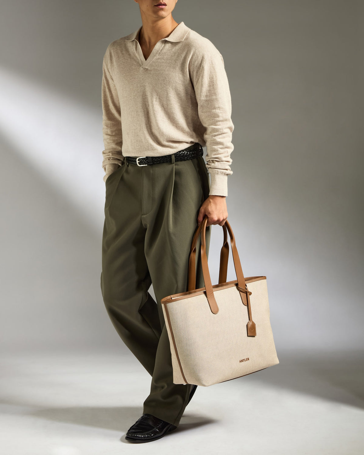 a man holding a bag