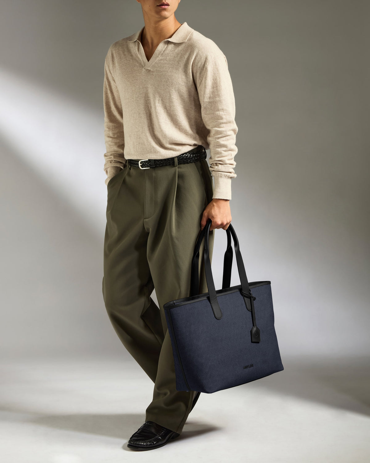 a man holding a bag