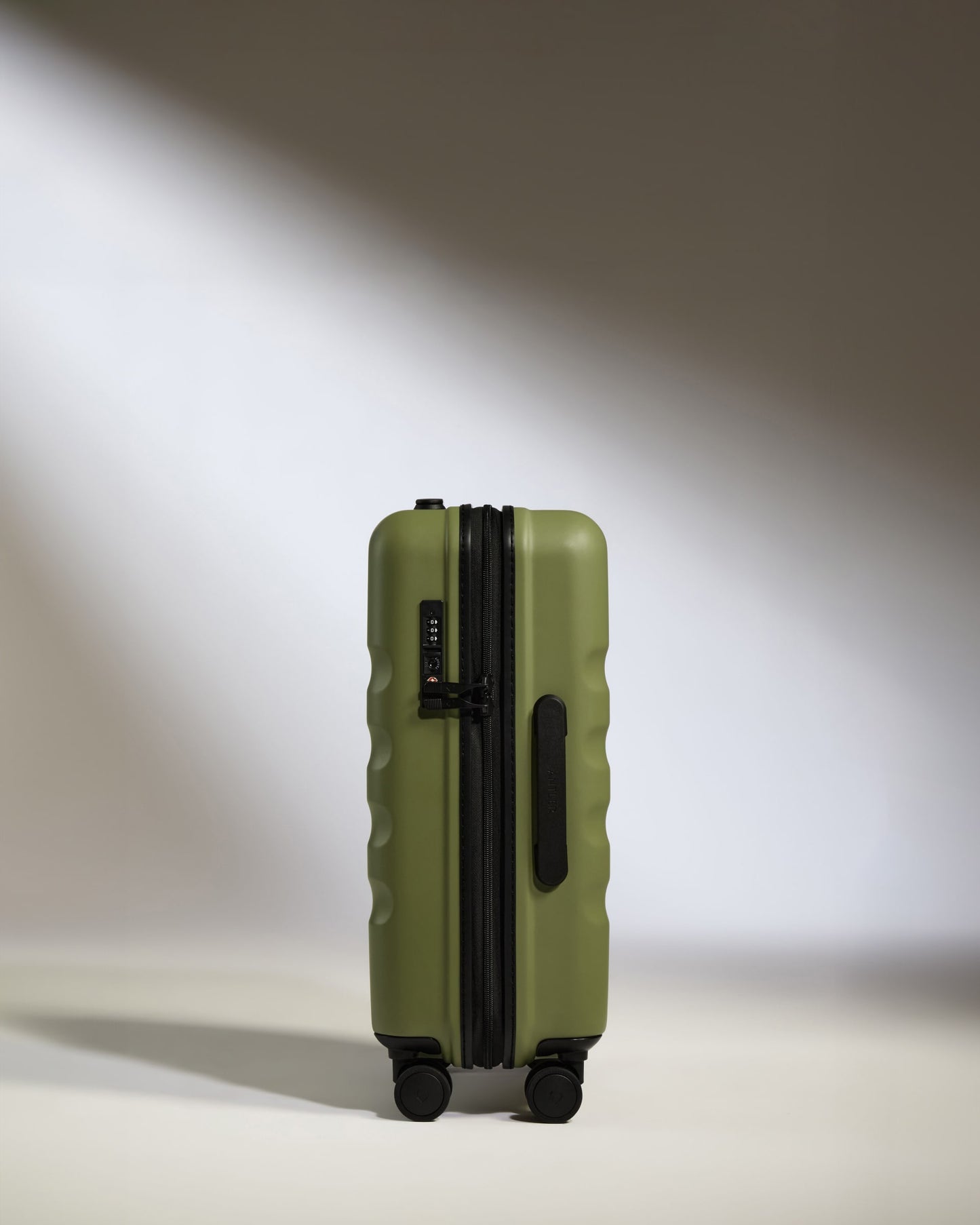 Cabin Suitcase in Fern Green - Icon Stripe