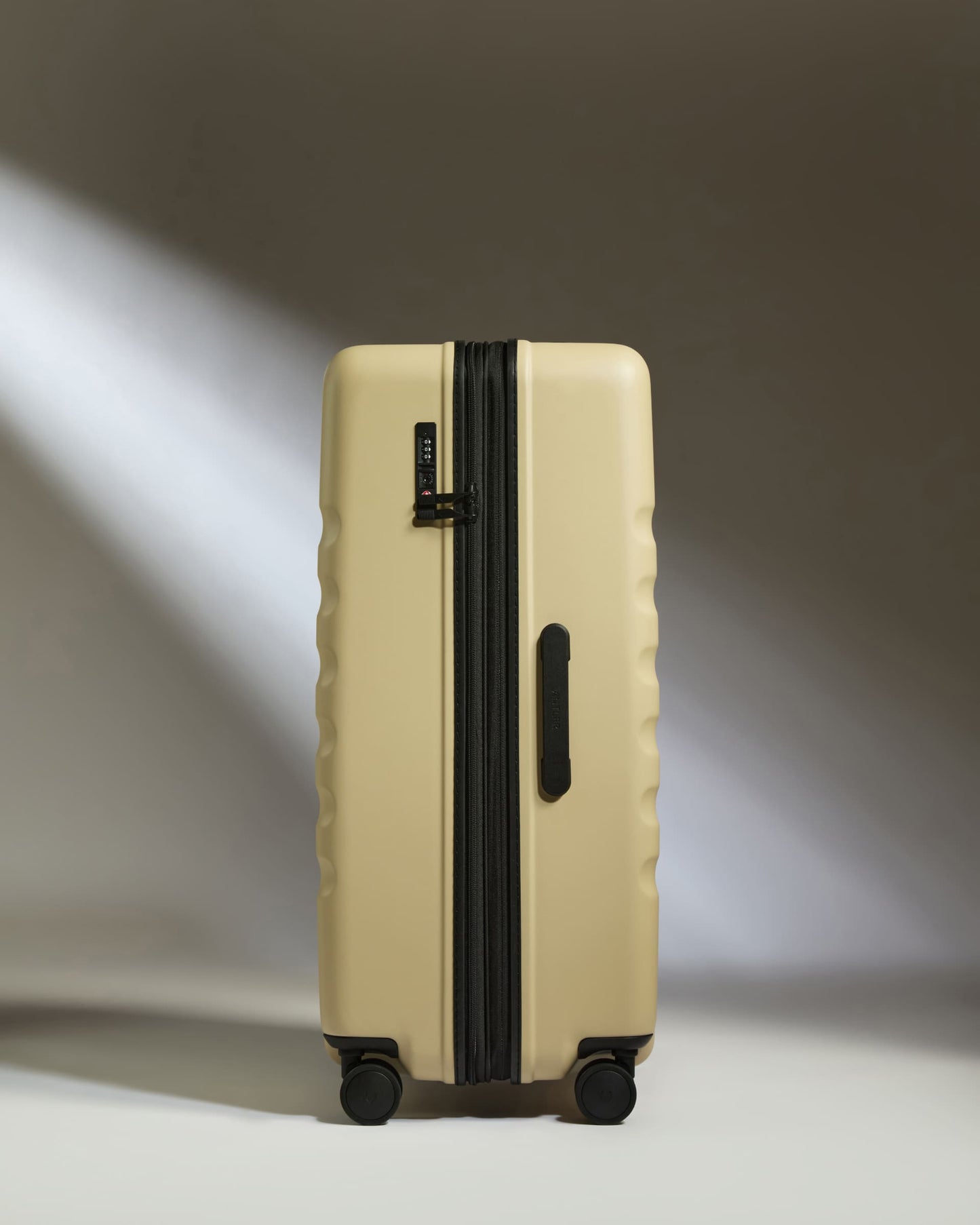 Large Suitcase in Dune Yellow - Icon Stripe