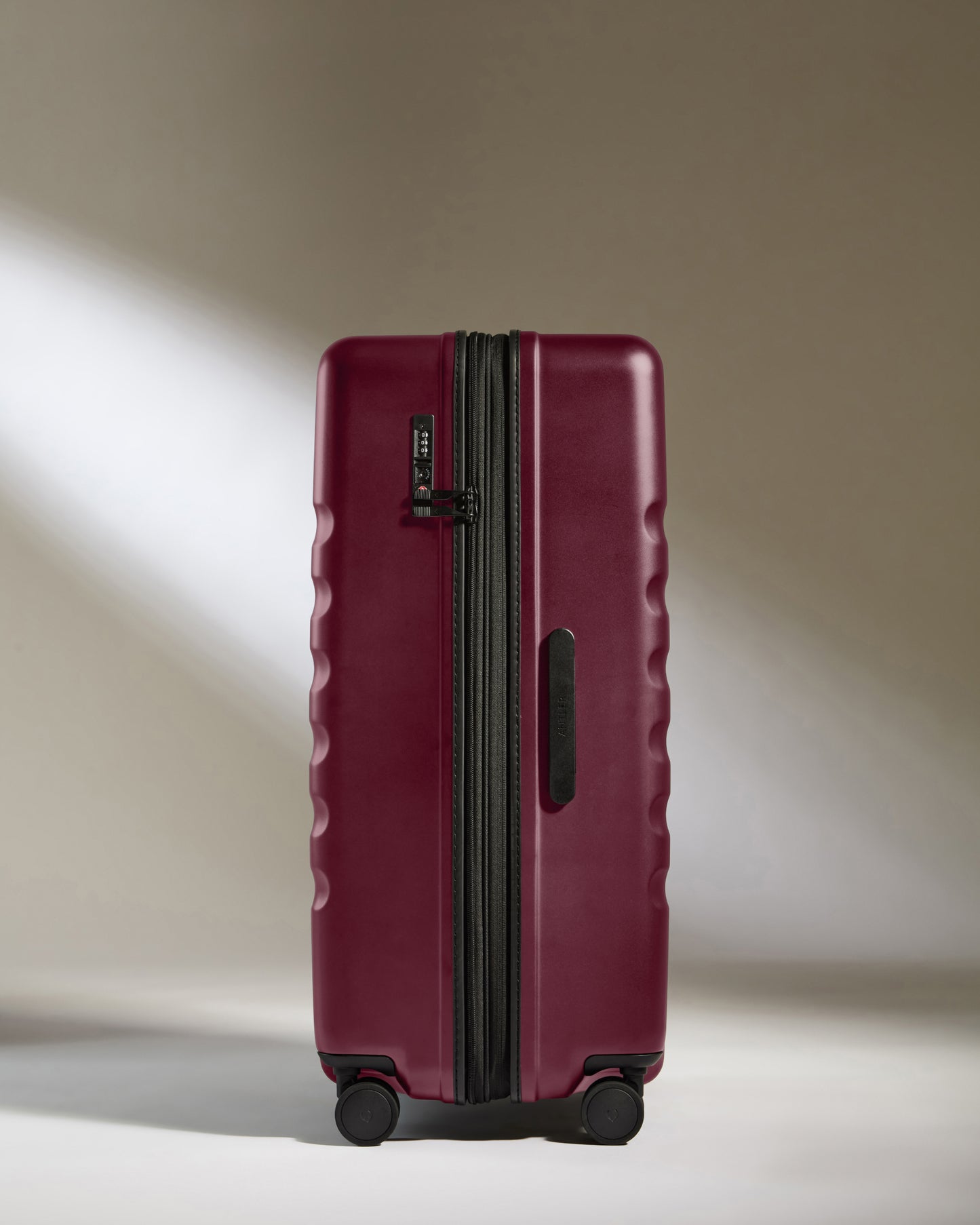 Large Suitcase in Heather Purple - Icon Stripe