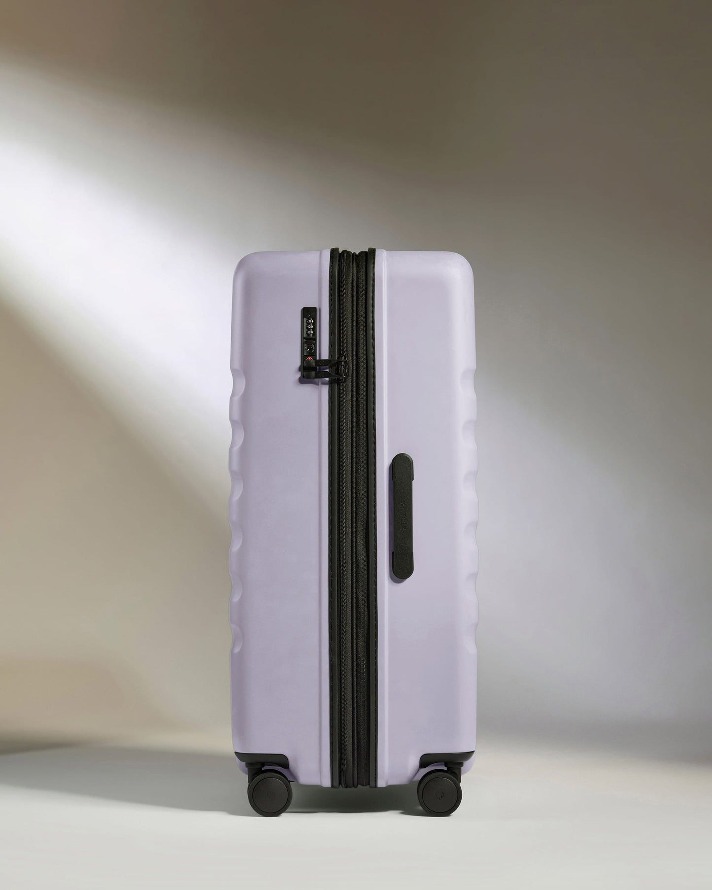 Large Suitcase in Meadow Purple - Icon Stripe