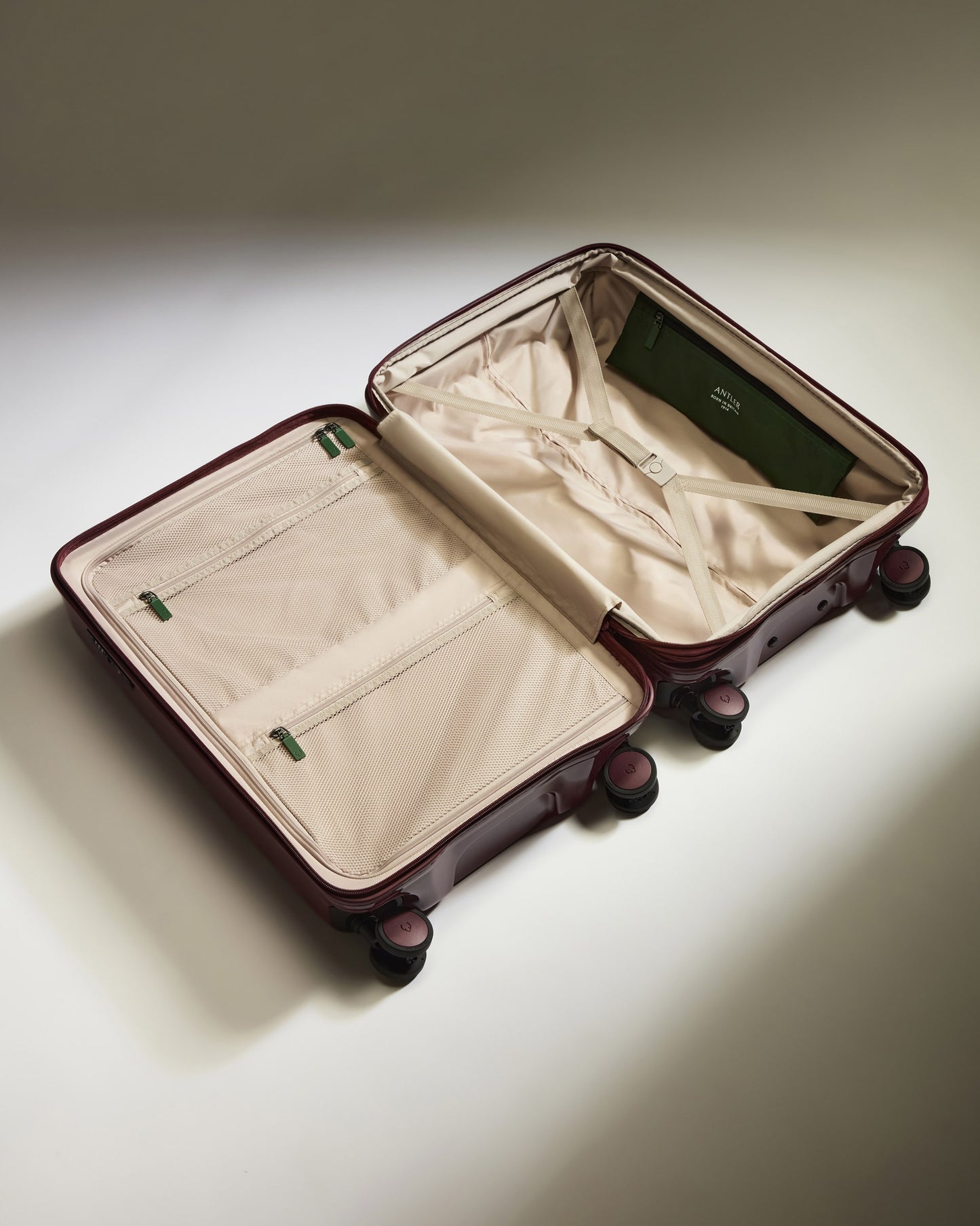 Medium Suitcase in Cedar Red Gloss - Icon Stripe