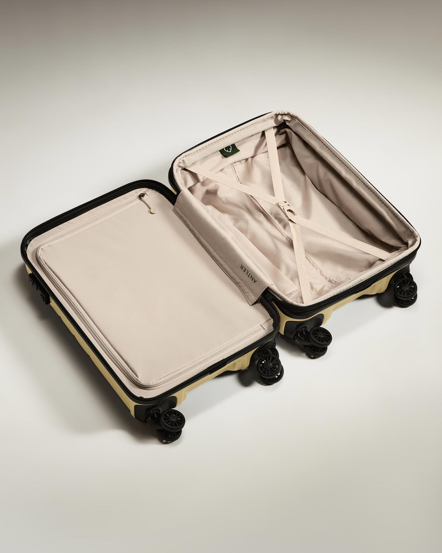 Expandable Cabin Suitcase in Dark Sand - Logo