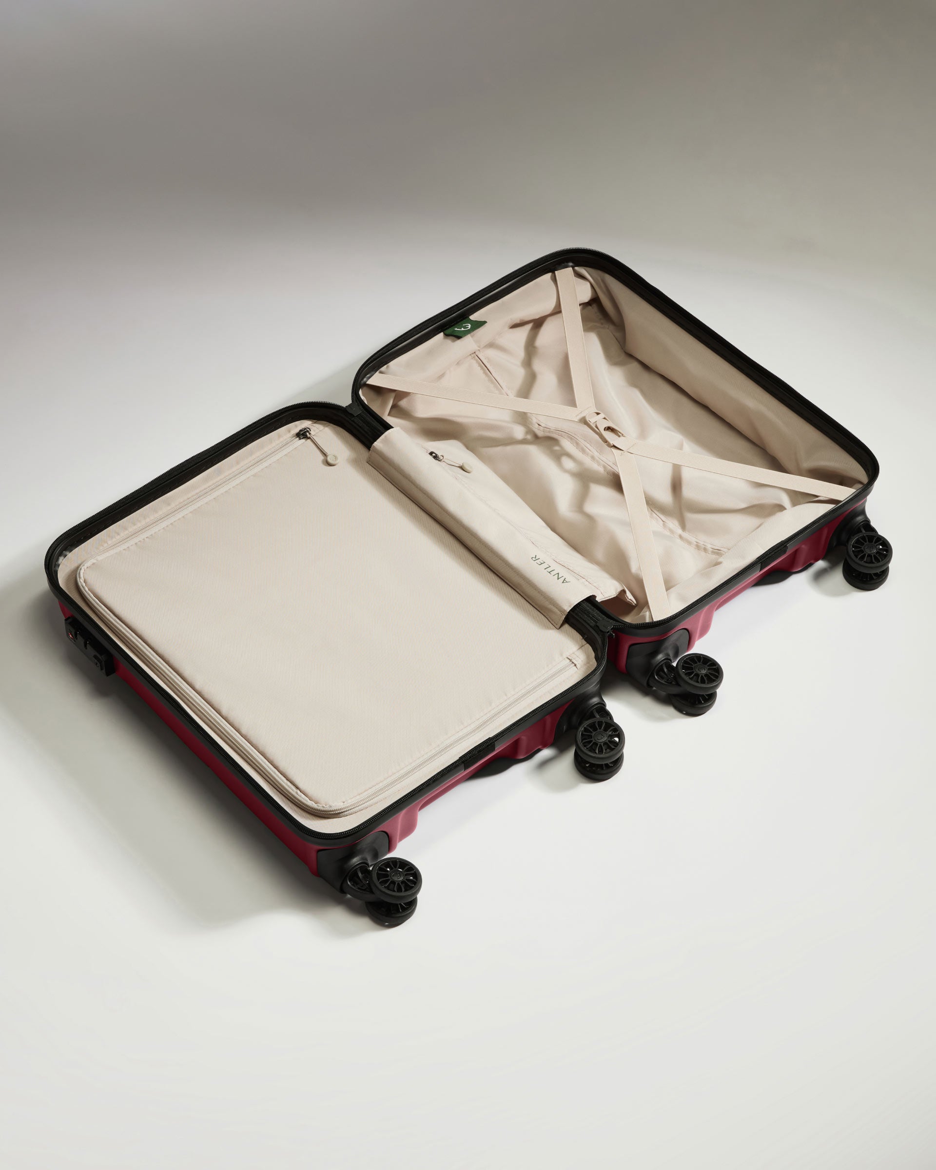 a suitcase with wheels and a lid