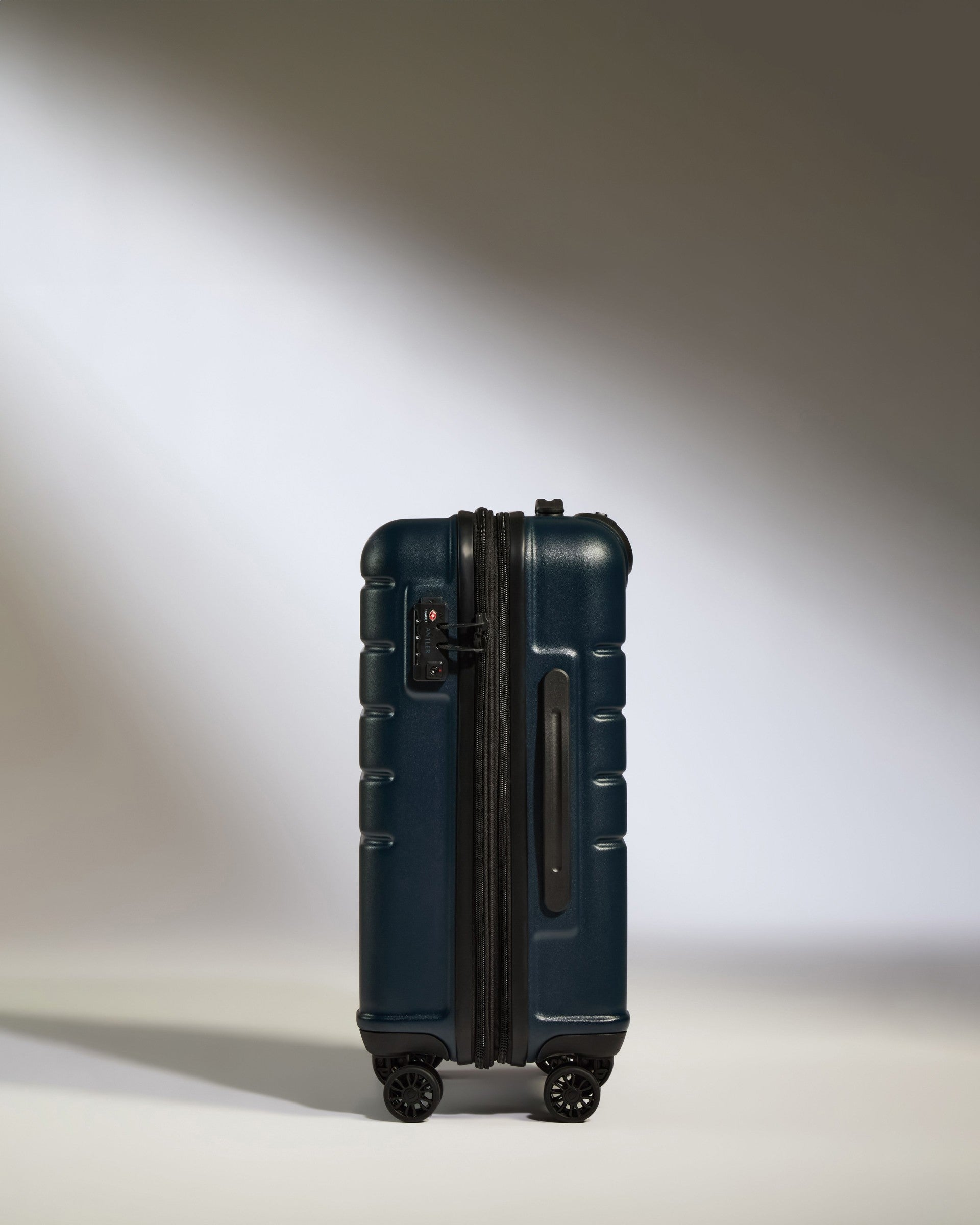 a blue suitcase with wheels