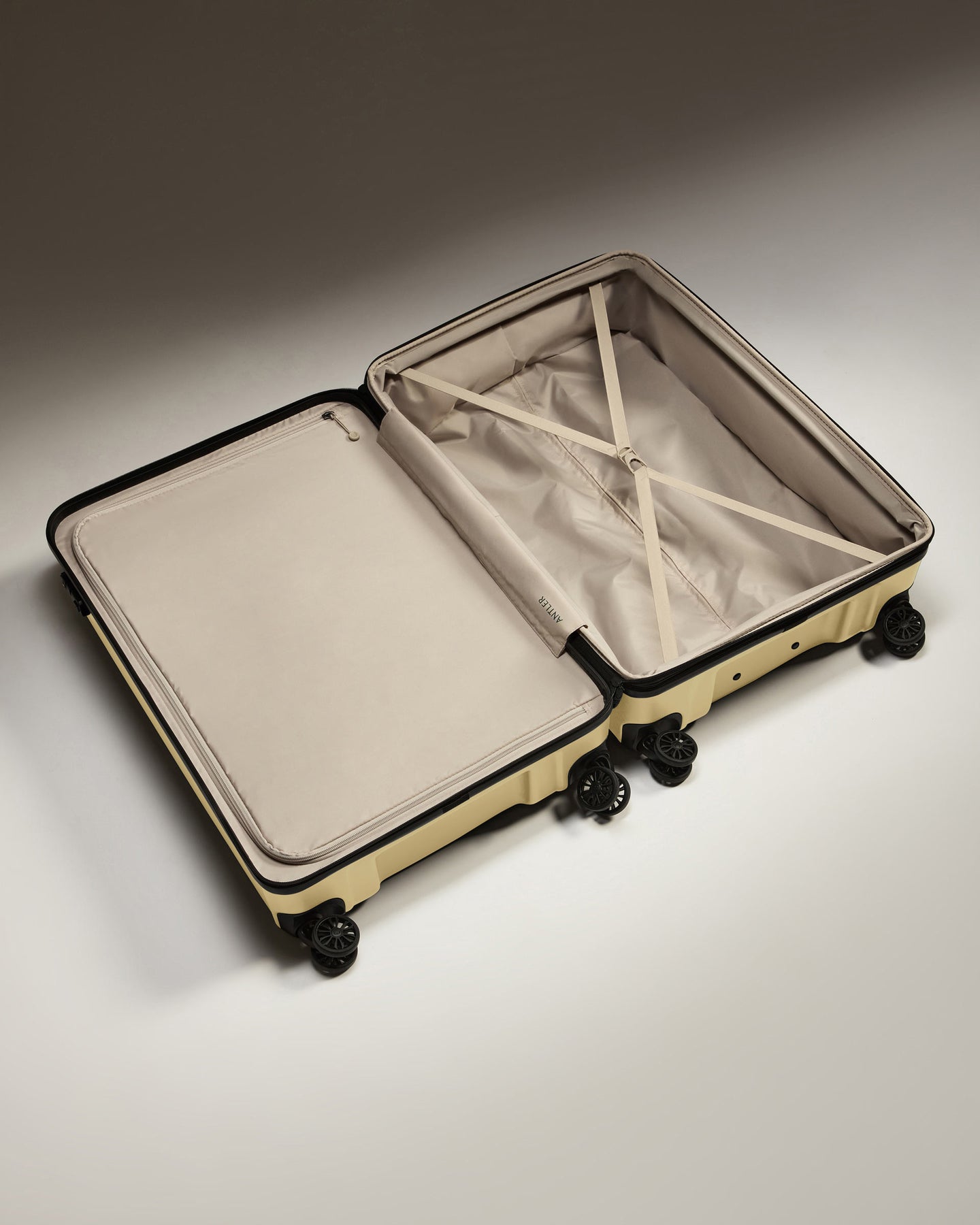 Suitcase Set in Dark Sand - Logo