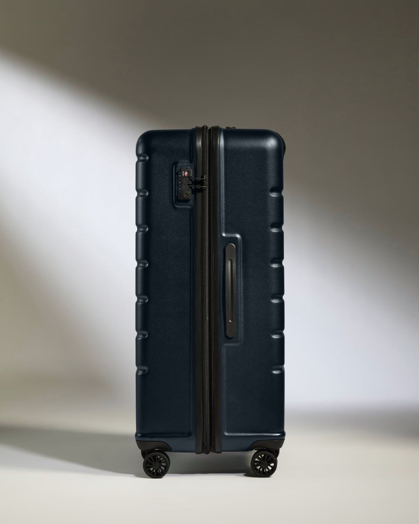 Large Suitcase in Dark Navy - Logo