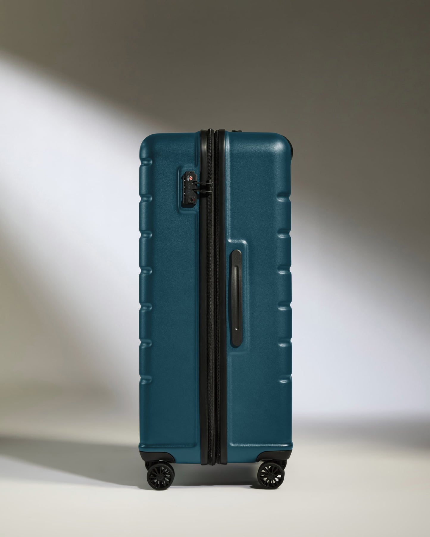 Large Suitcase in Soft Blue - Logo