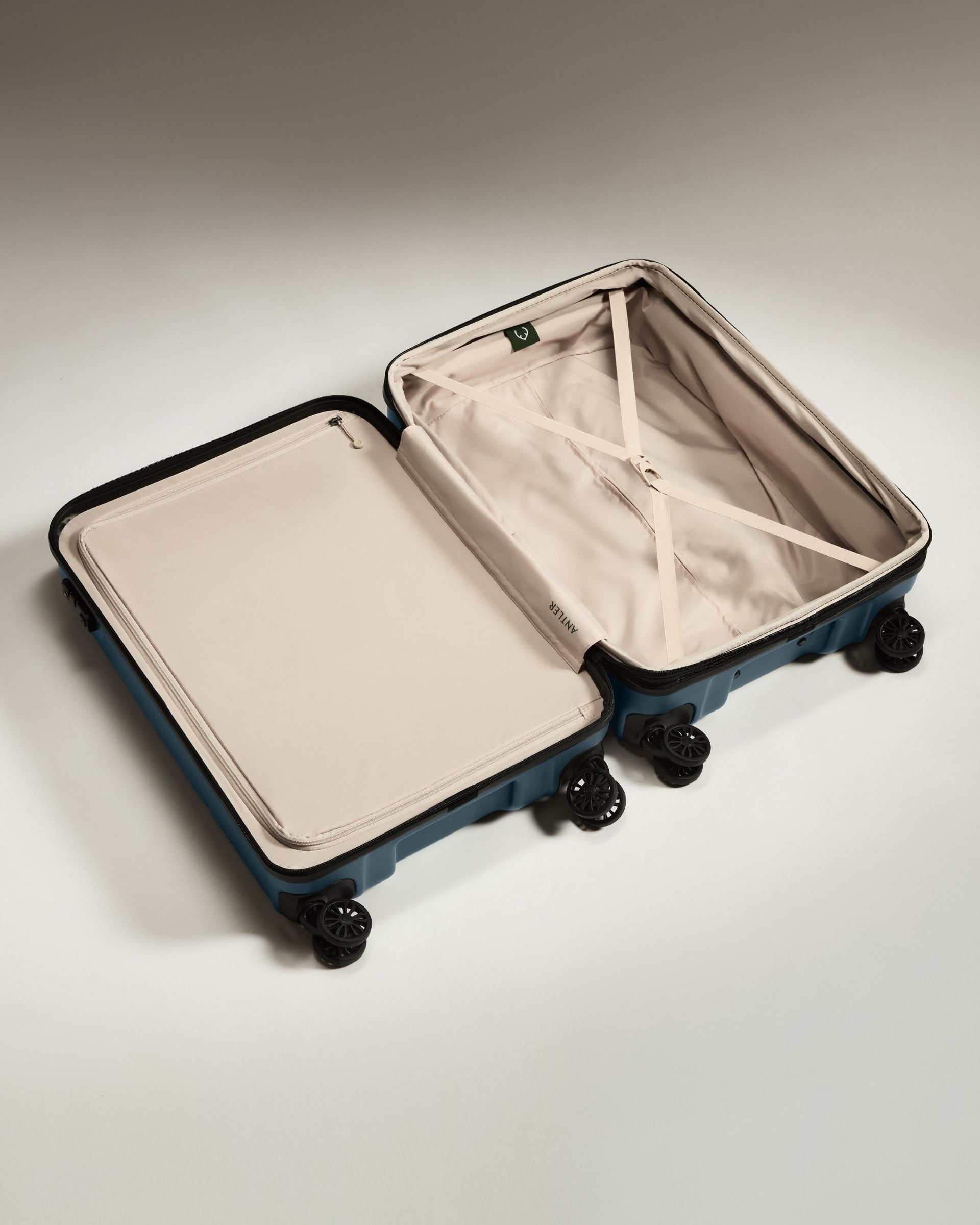 a suitcase with wheels and a lid