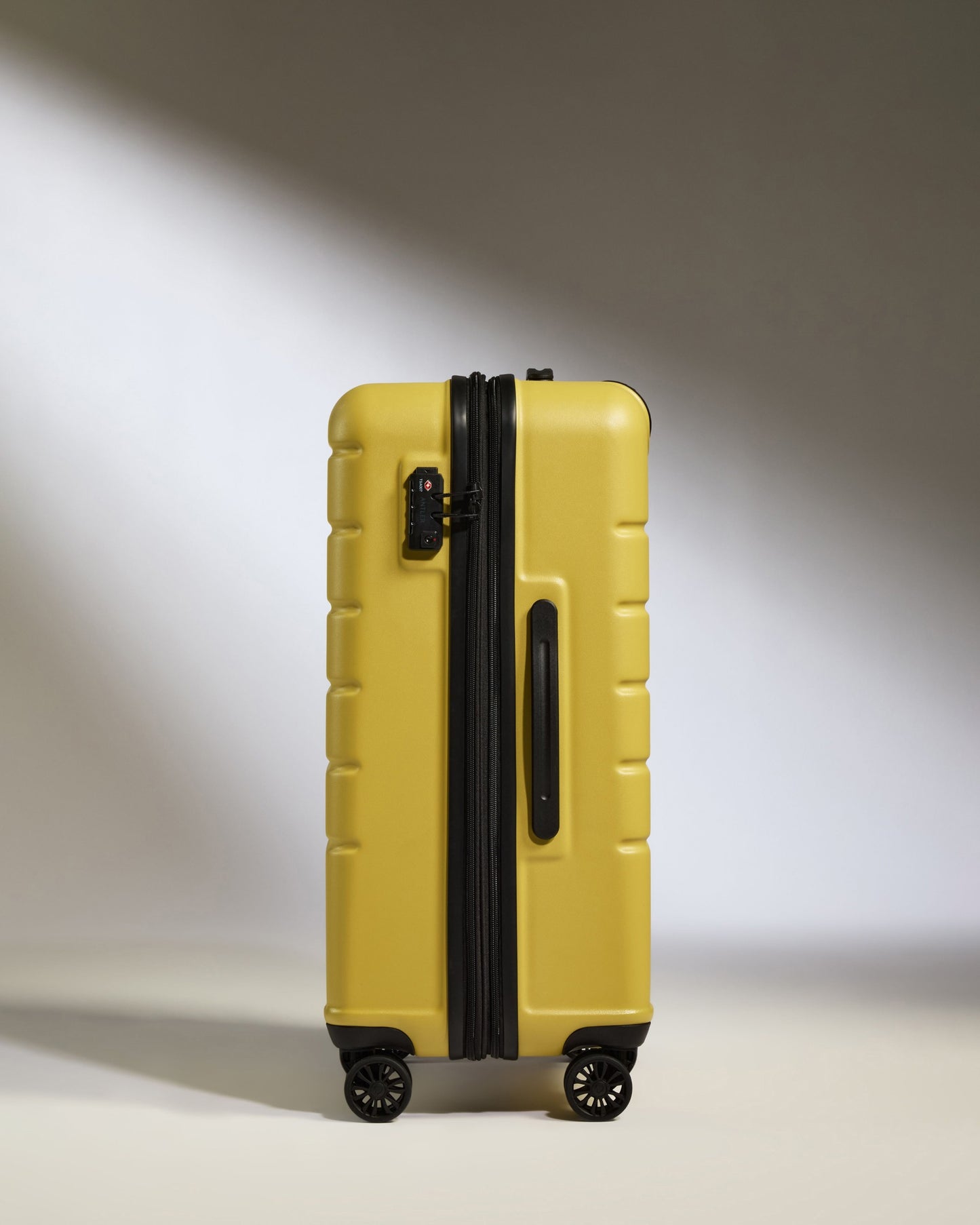 Medium Suitcase in Mustard Yellow - Logo