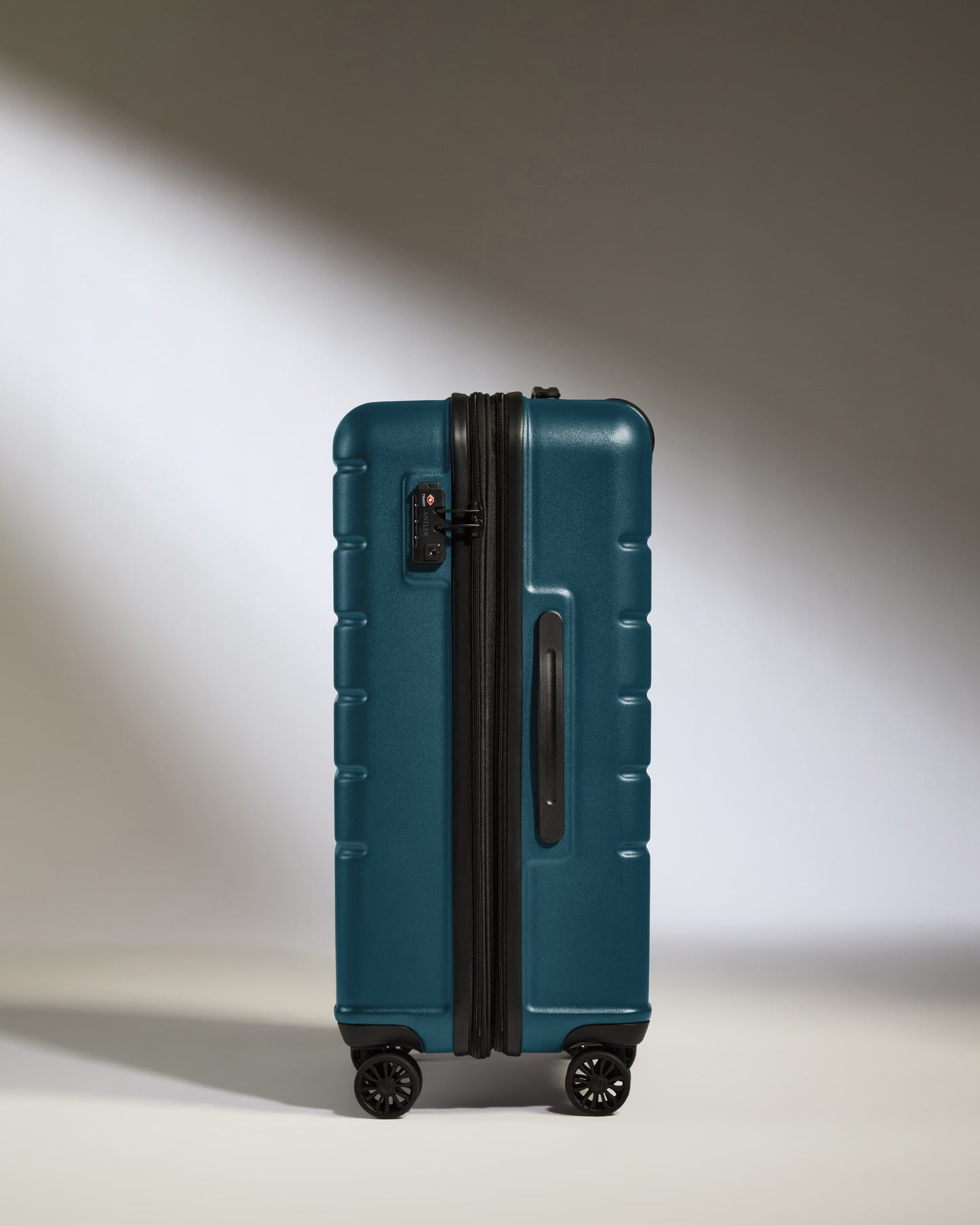 Medium Suitcase in Soft Blue - Logo