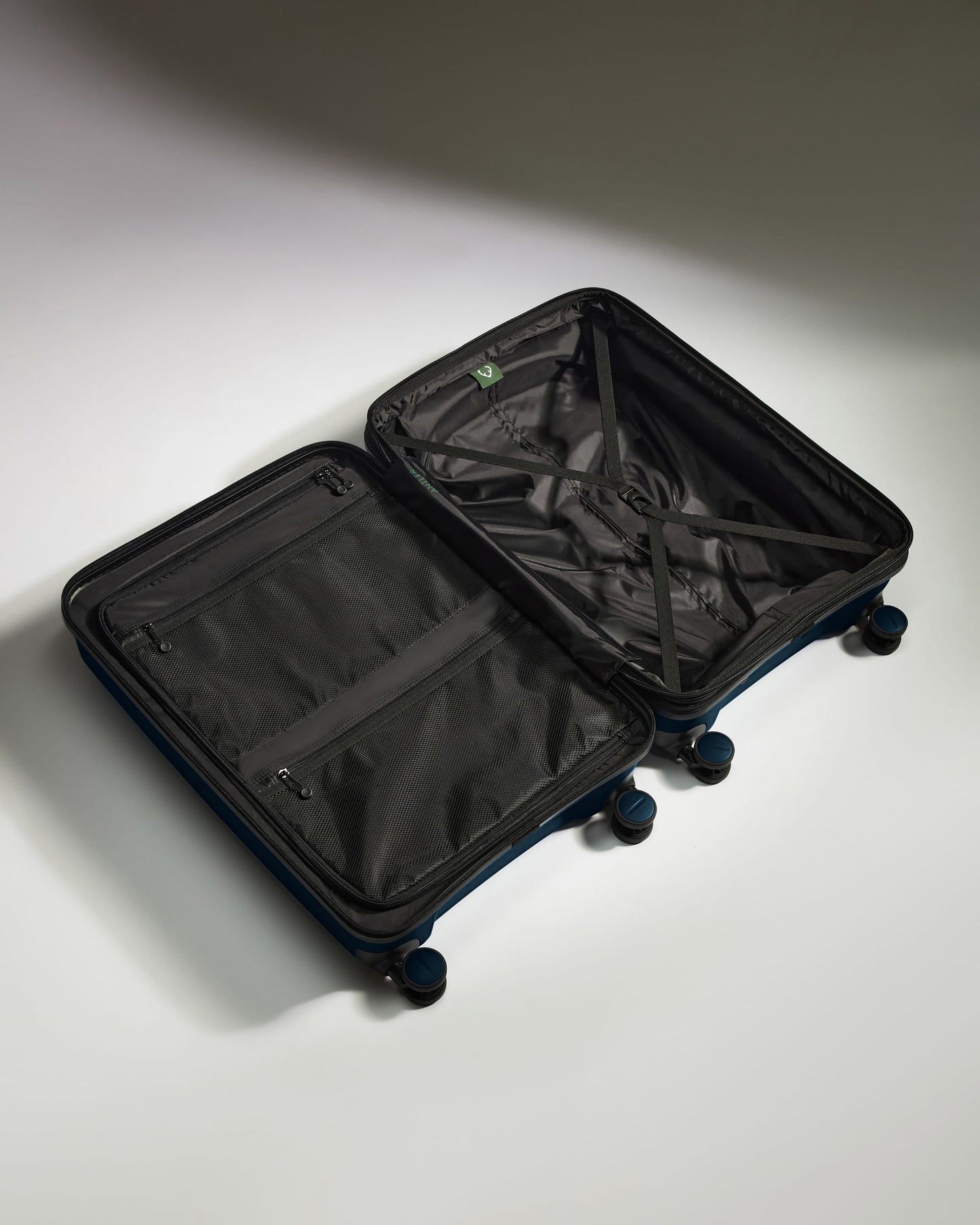 Medium Suitcase in Midnight Blue - Logo Stripe