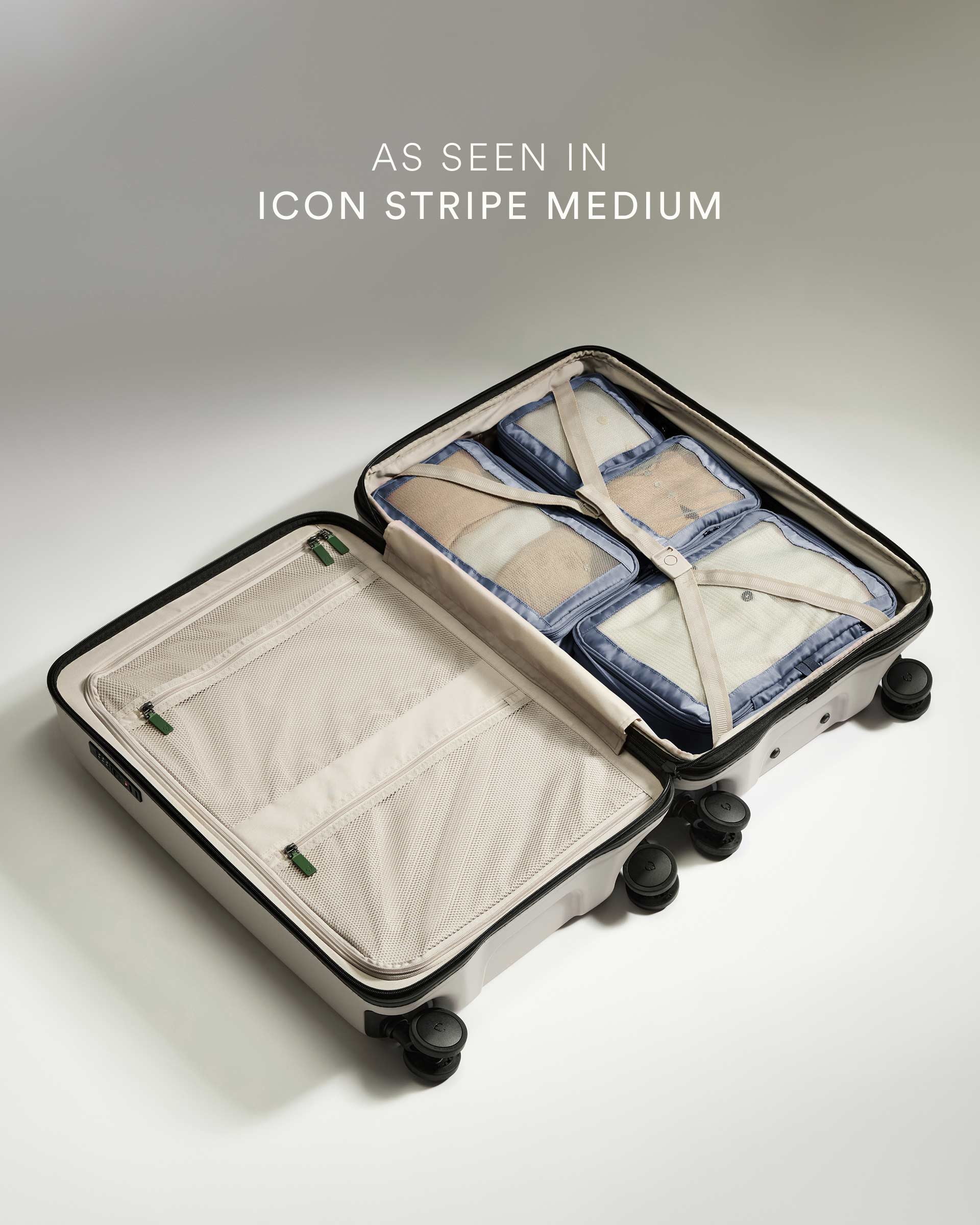 a suitcase with a few pieces of clothing