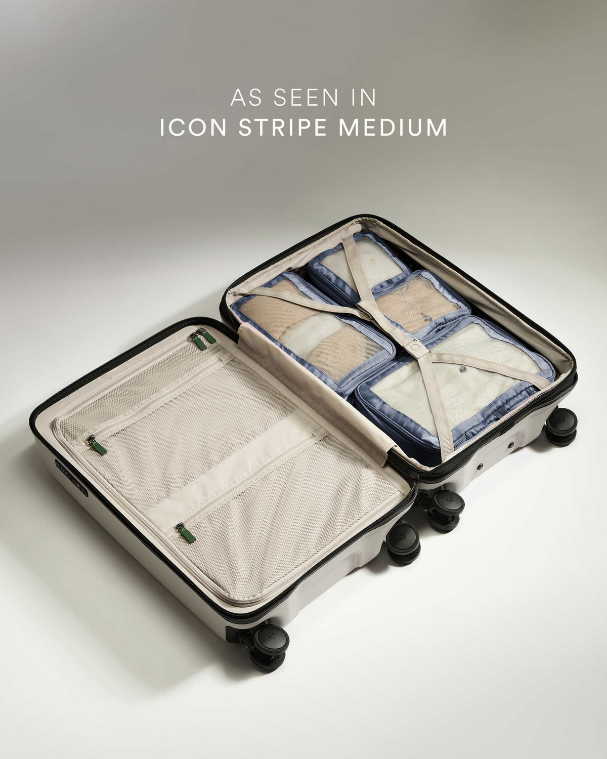 a suitcase with a few pieces of clothing
