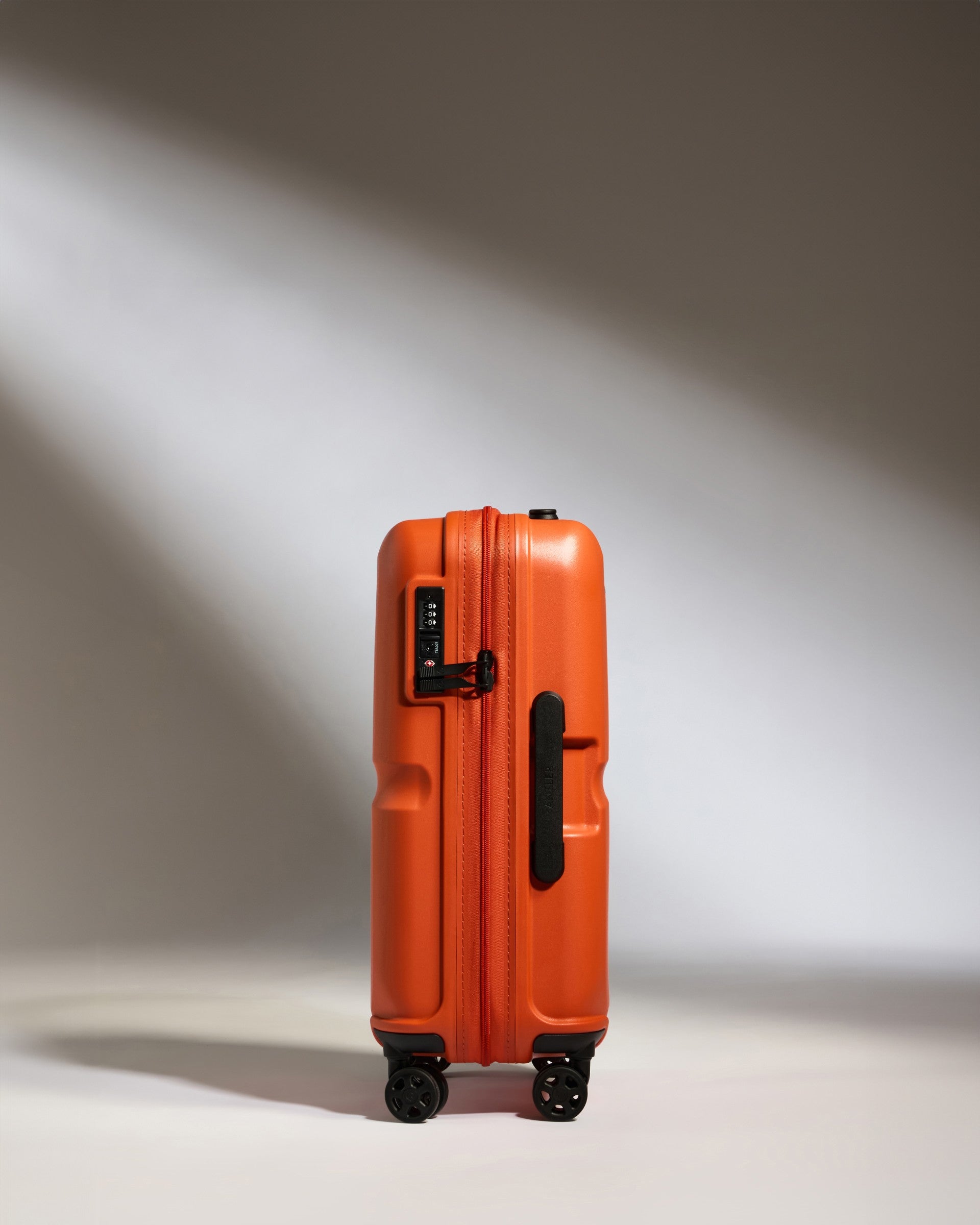 Cabin Suitcase in Ember Orange Single Stripe