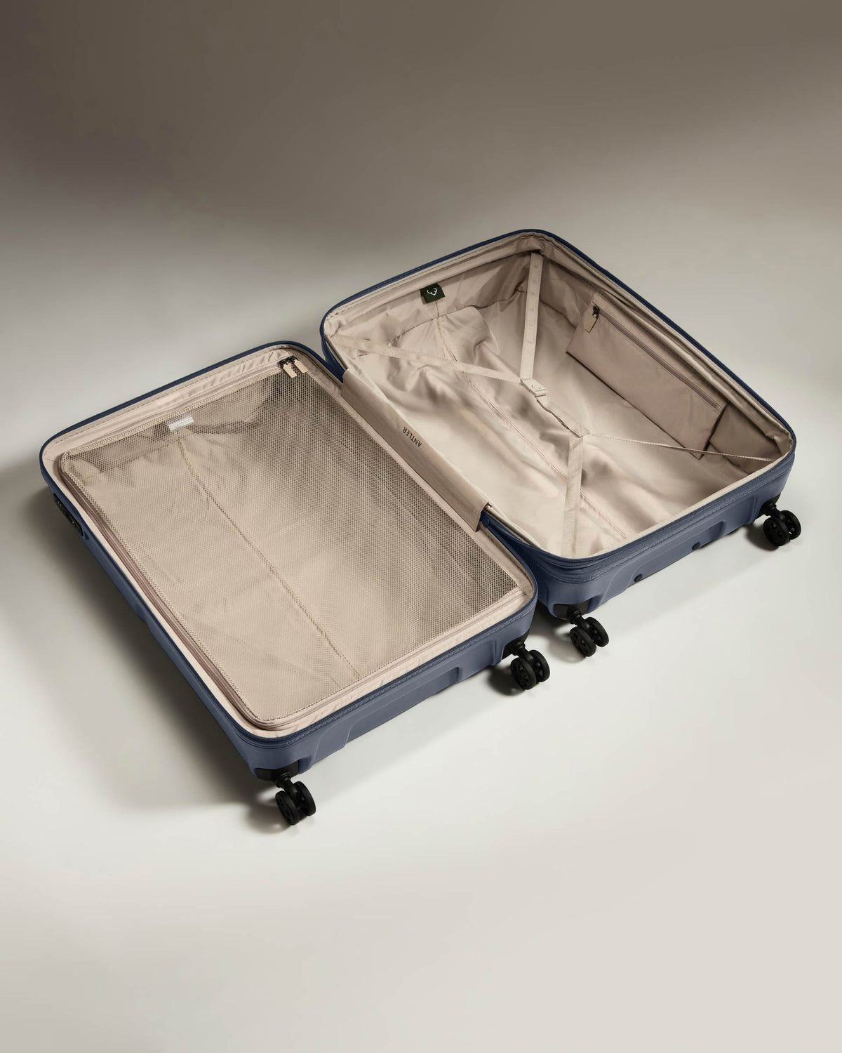 a suitcase with wheels and empty space