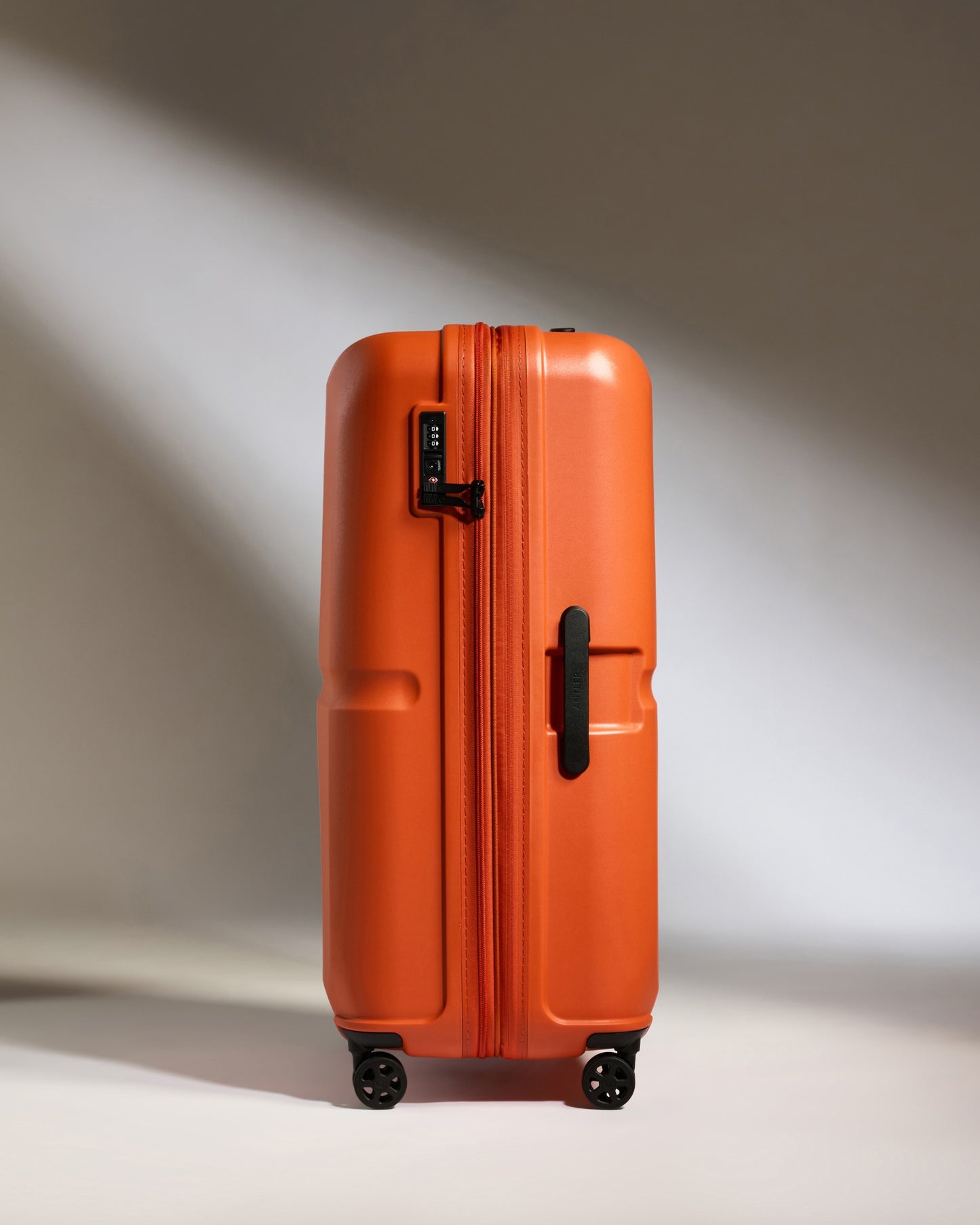 Large Suitcase in Ember Orange - Single Stripe