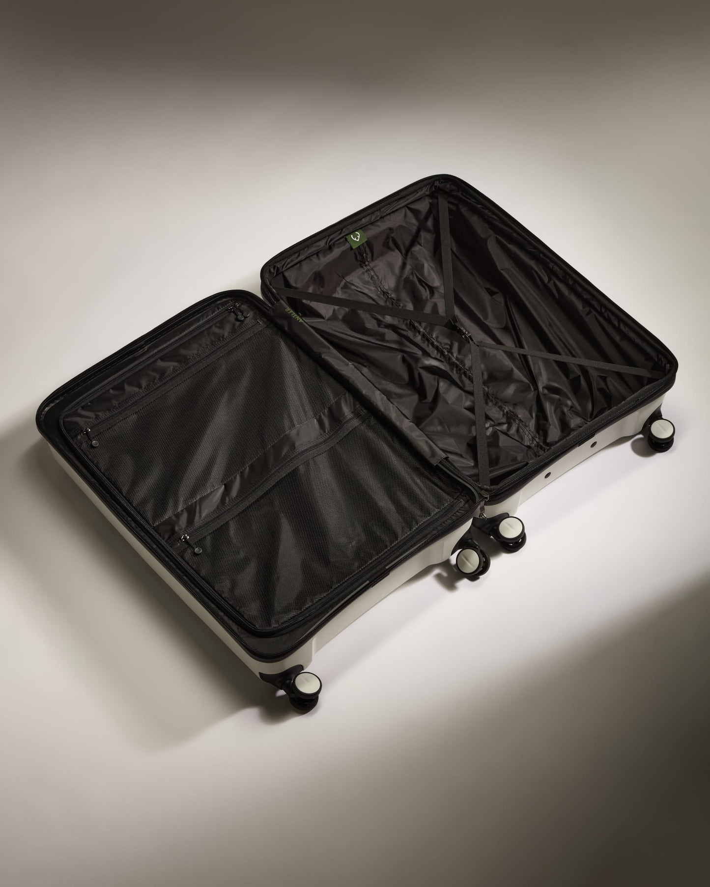 Large Suitcase in White - Logo Stripe