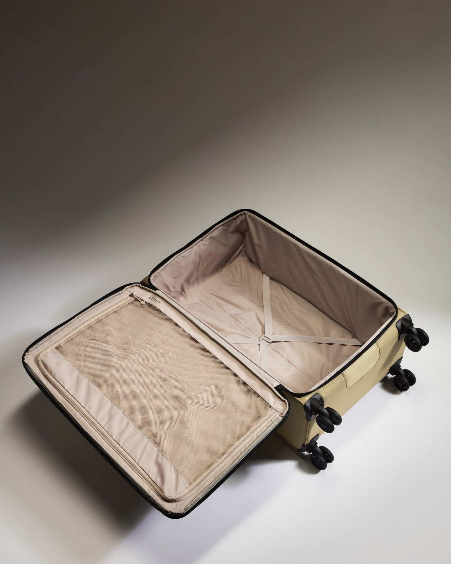 Lightest Large Suitcase in Sand - Soft Stripe 2.0