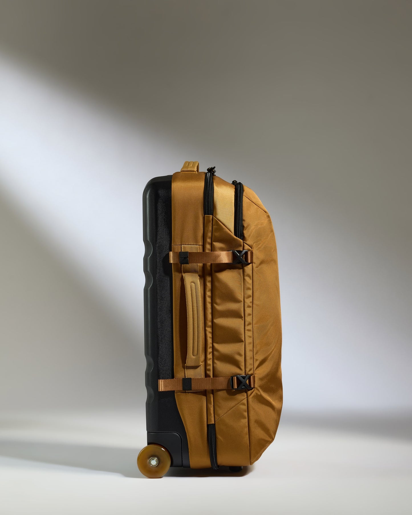Discovery Wheeled Duffel in Mustard Yellow
