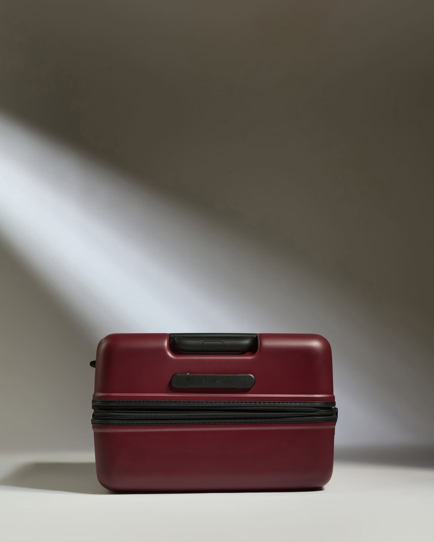 Large Suitcase in Cedar Red - Icon Stripe