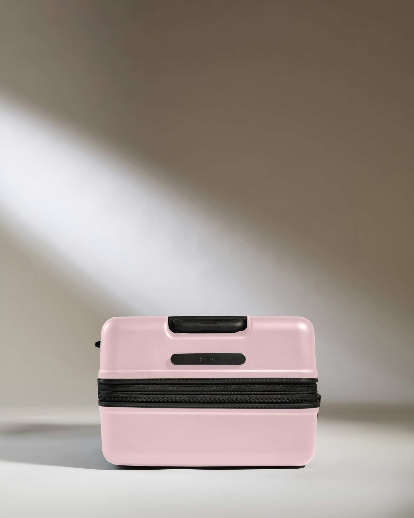 Large Suitcase in Moorland Pink - Icon Stripe