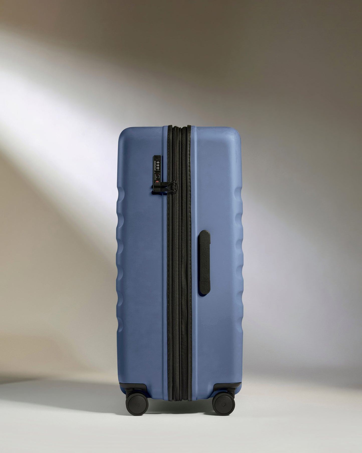 Large Suitcase in Ocean Blue - Icon Stripe