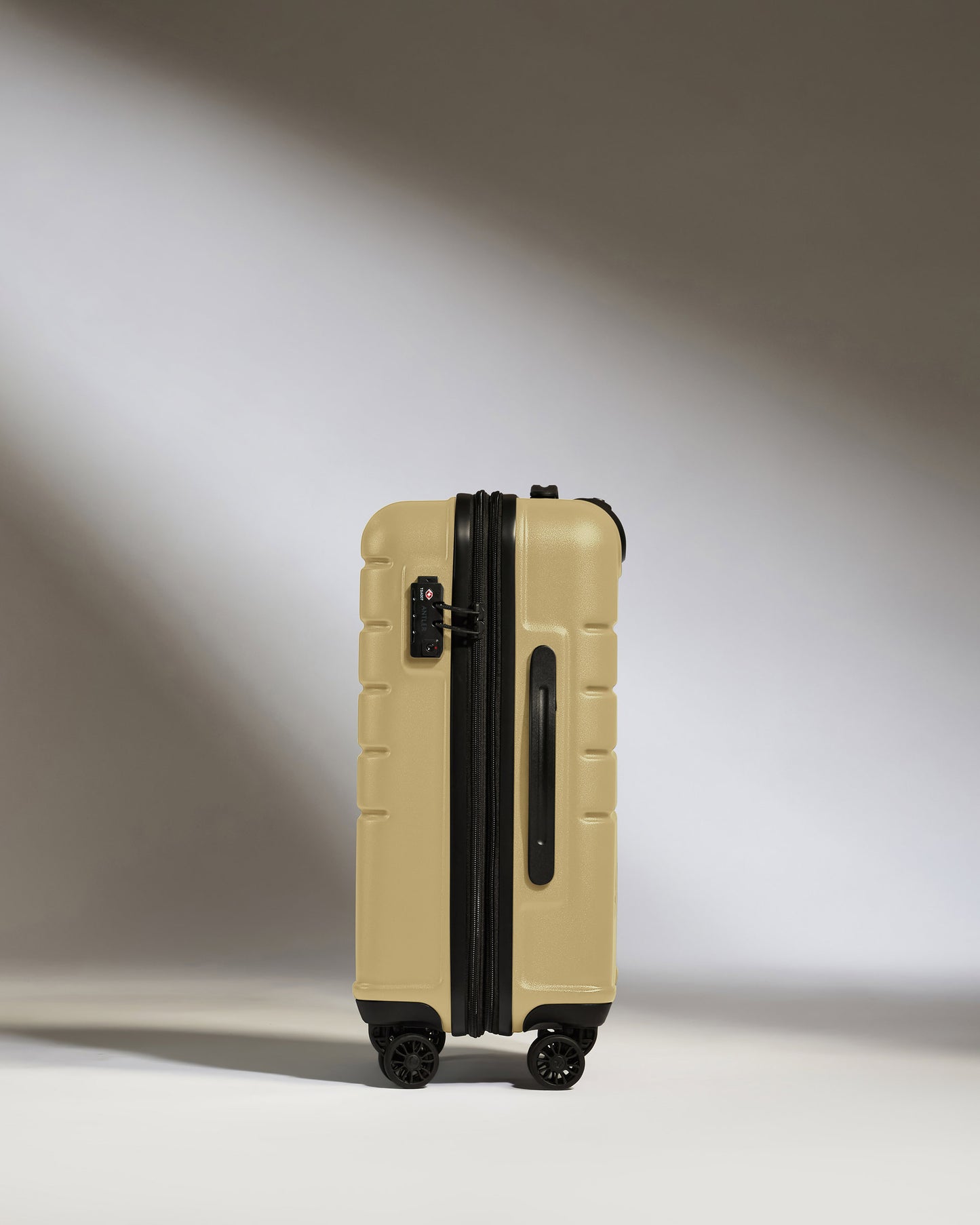 Expandable Cabin Suitcase in Dark Sand - Logo
