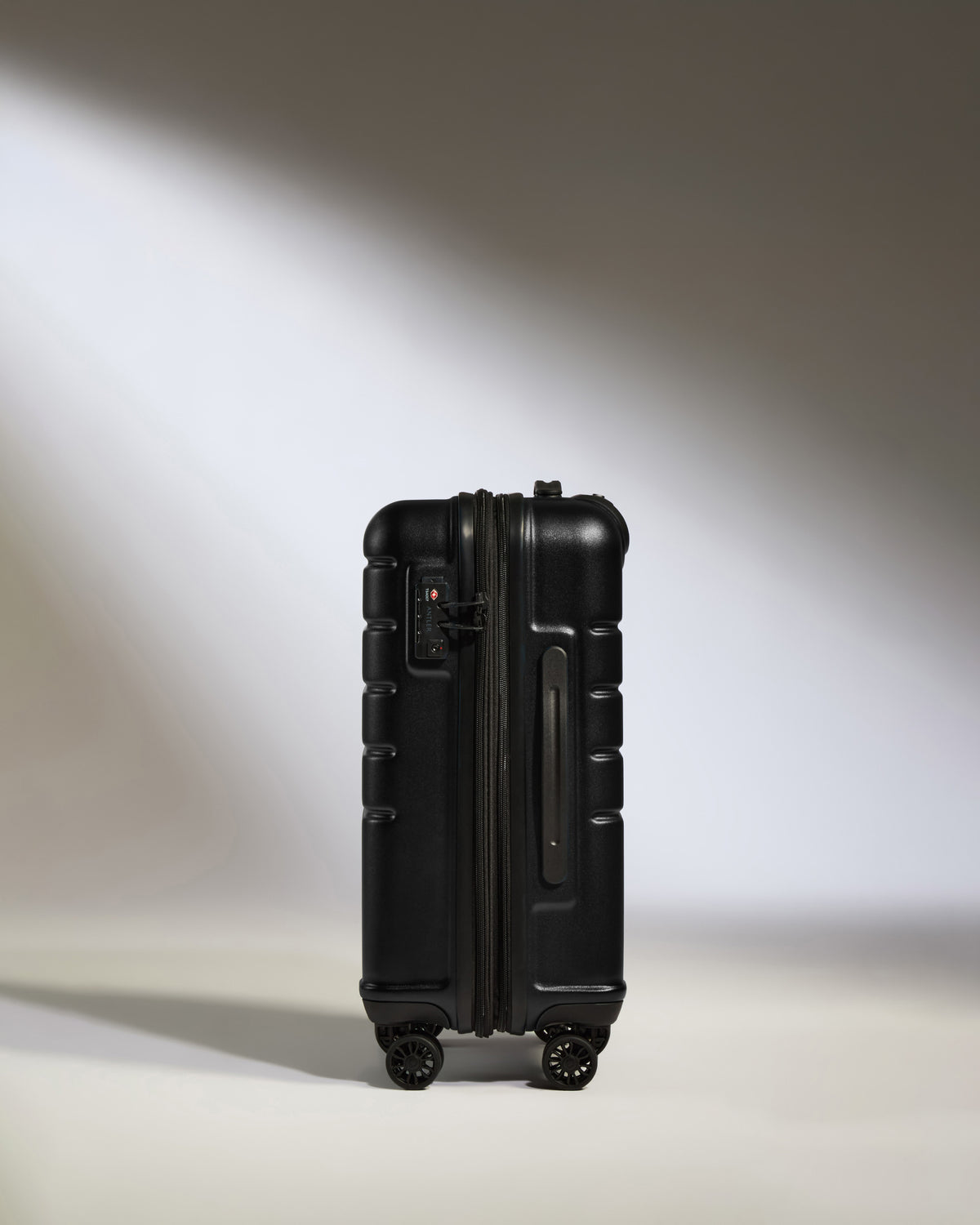 Cabin Suitcase in Black - Logo