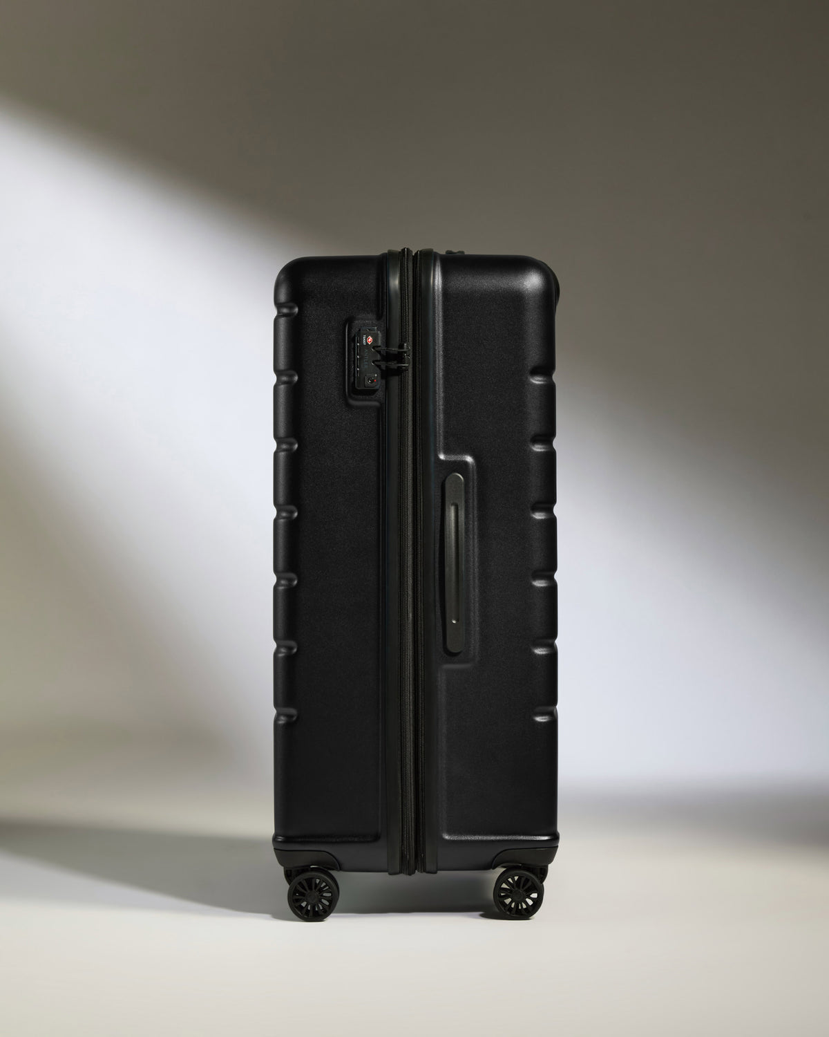a black suitcase with wheels