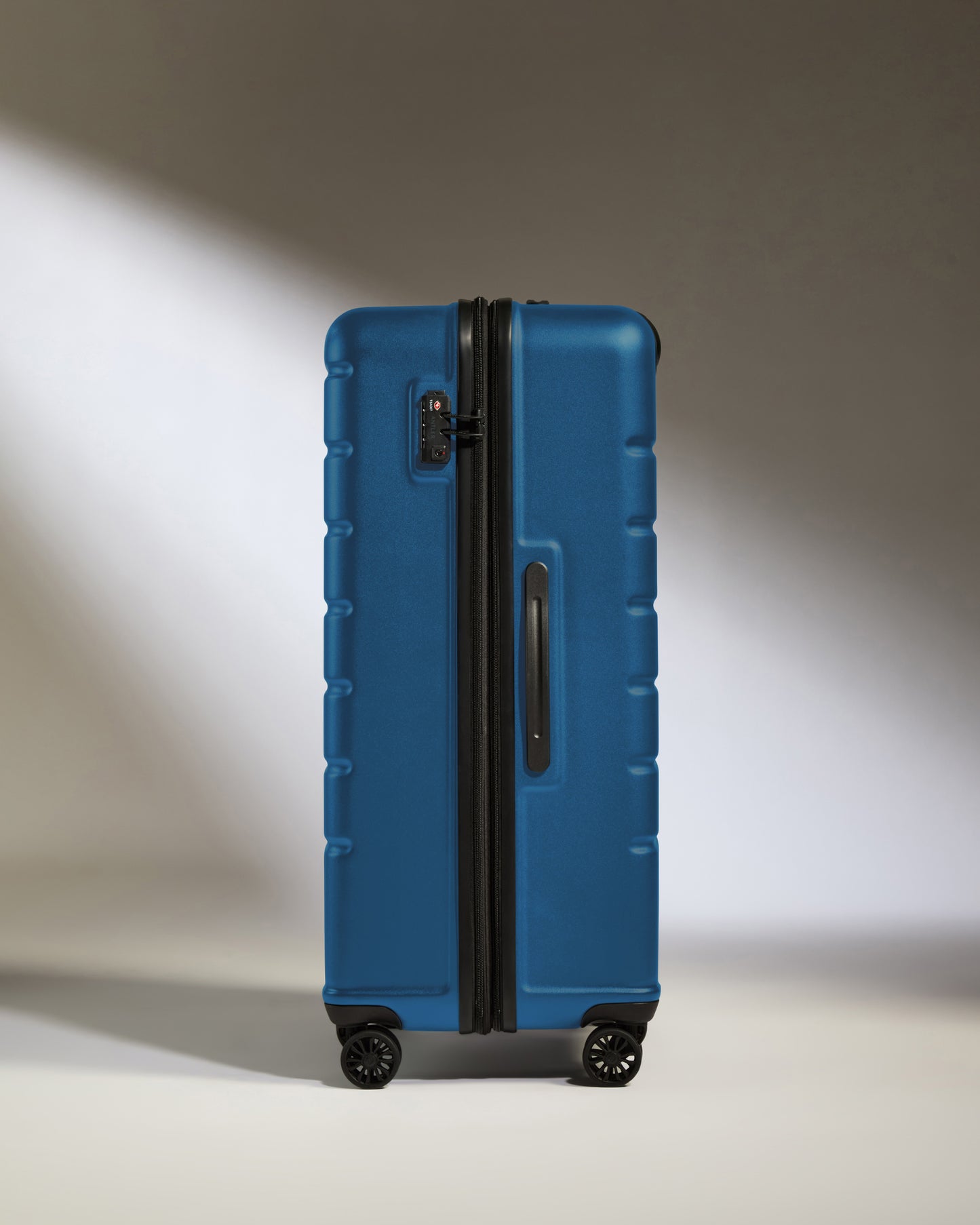 Large Suitcase in Bold Blue - Logo