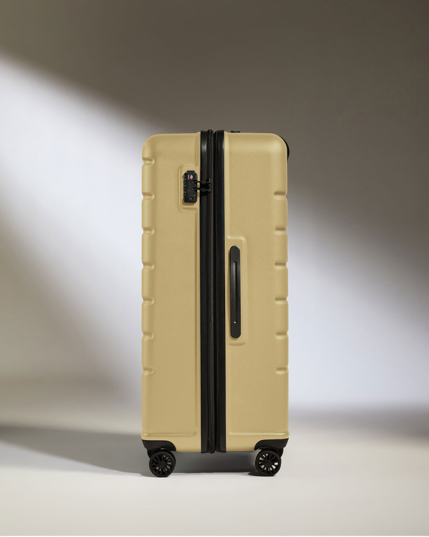 Expandable Suitcase Set in Dark Sand - Logo