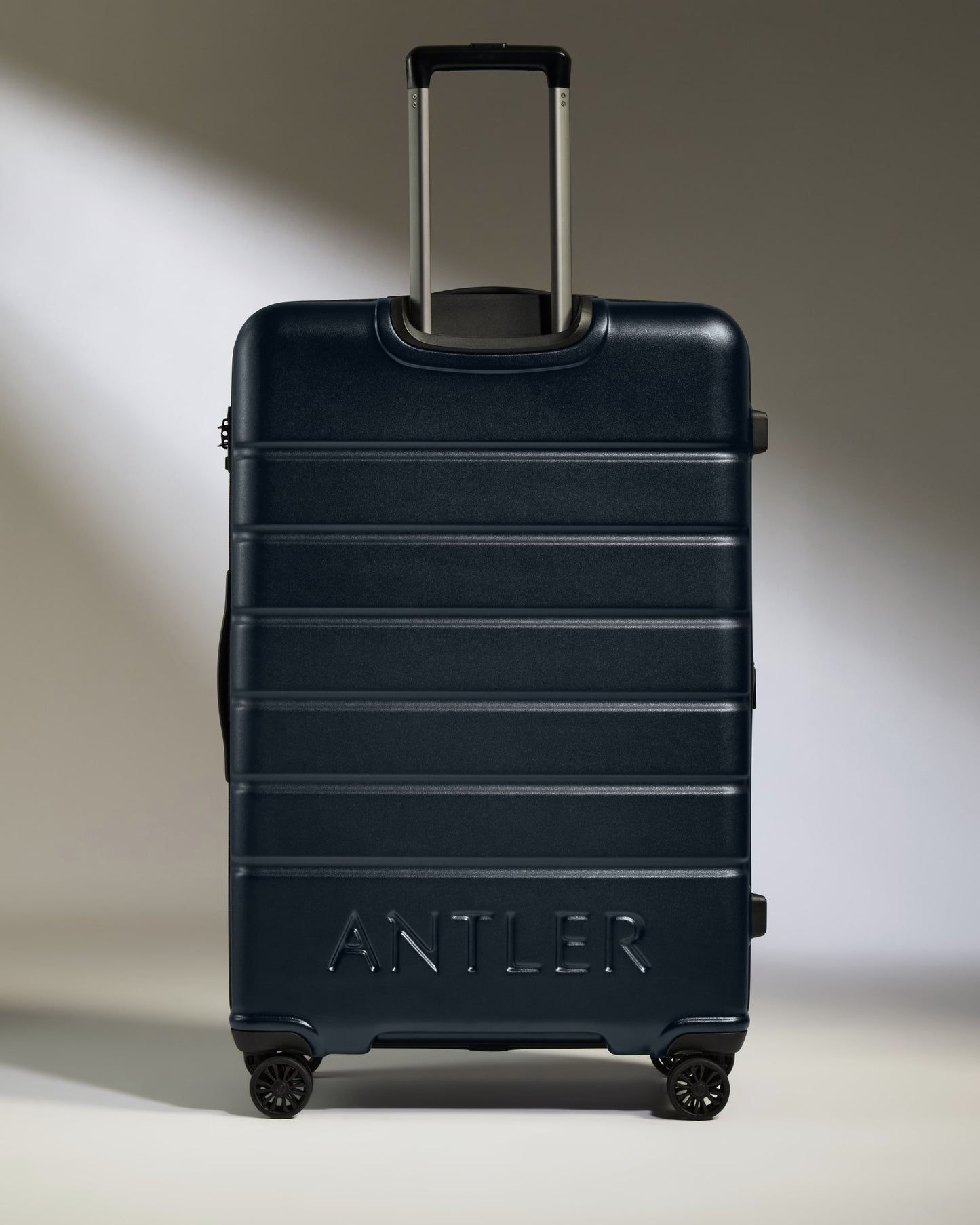 Large Suitcase in Dark Navy - Logo