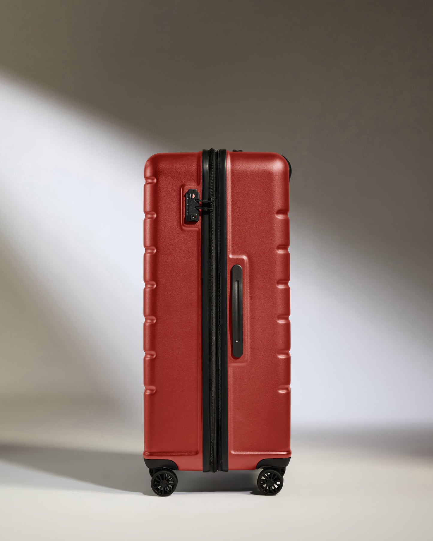 Large Suitcase in Red Orange - Logo