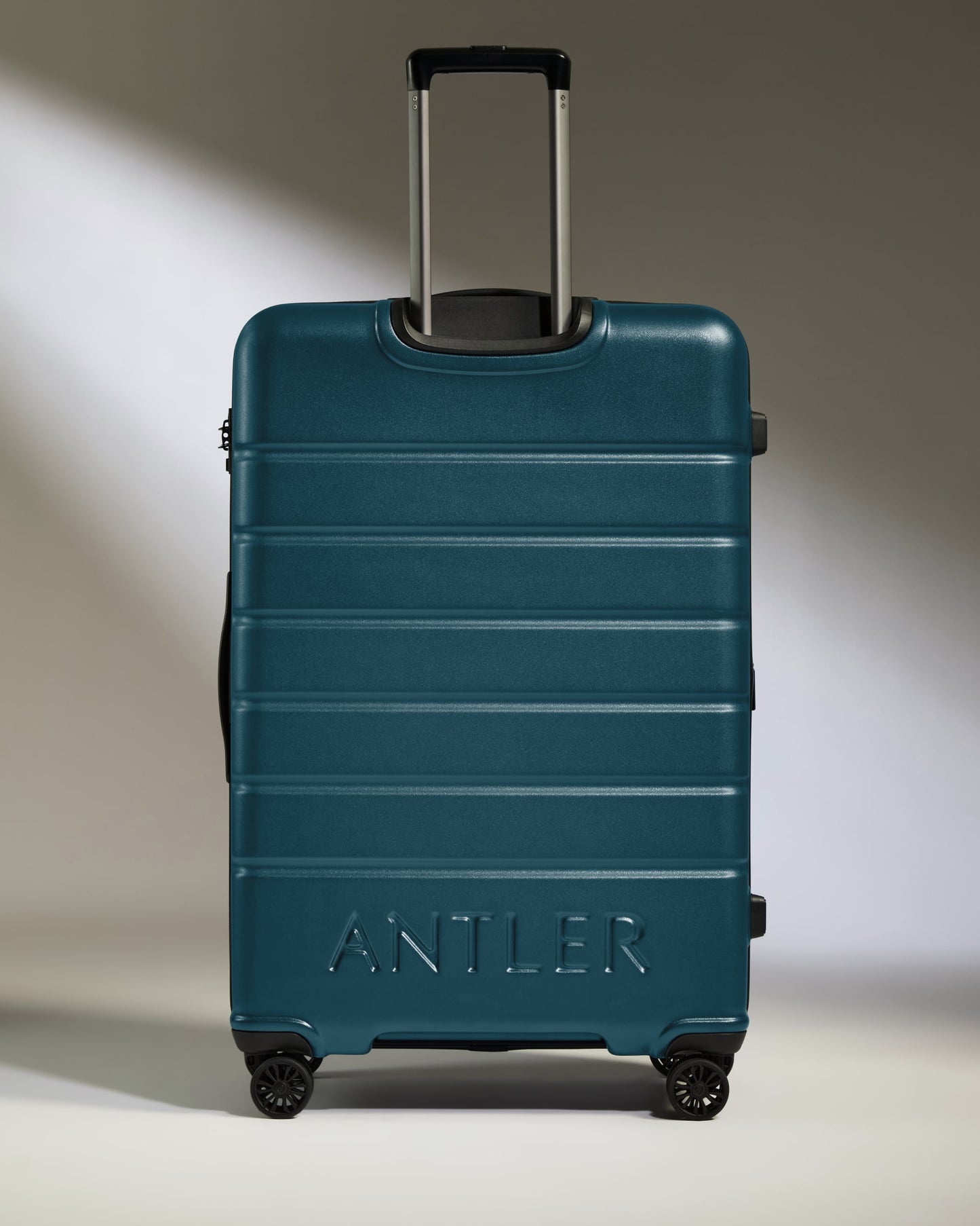 Large Suitcase in Soft Blue - Logo