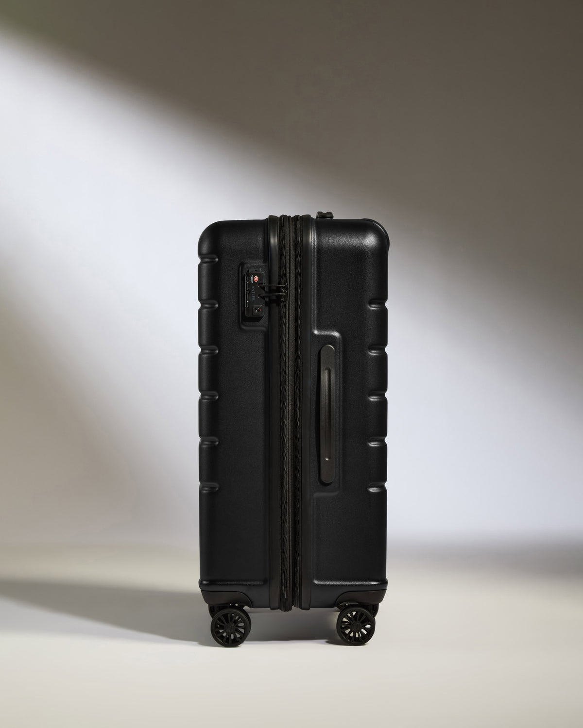 a black suitcase with wheels