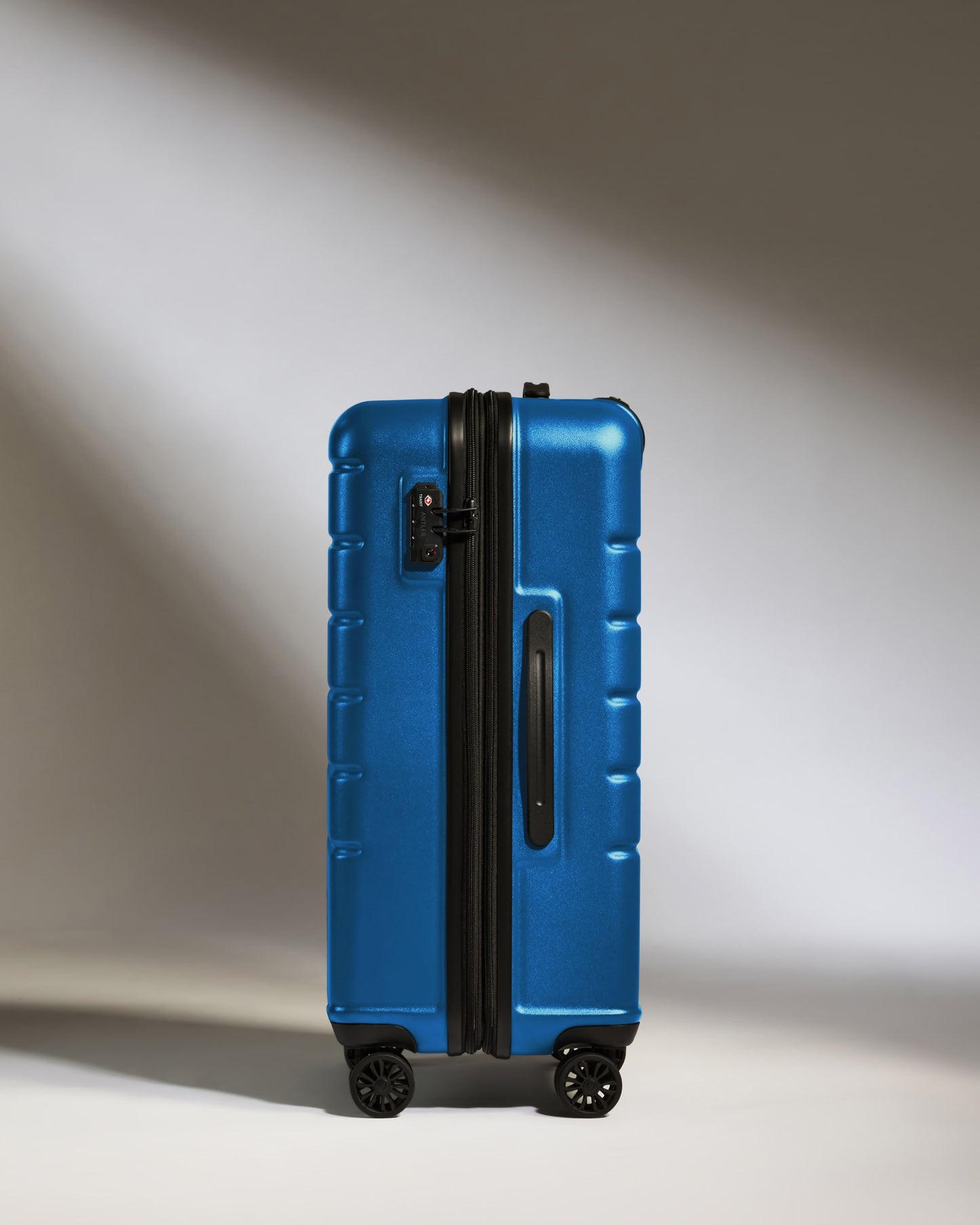Medium Suitcase in Bold Blue - Logo
