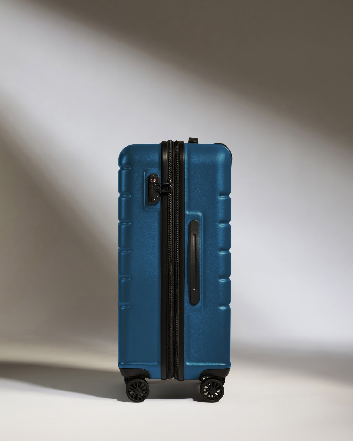 Medium Suitcase in Bold Blue - Logo