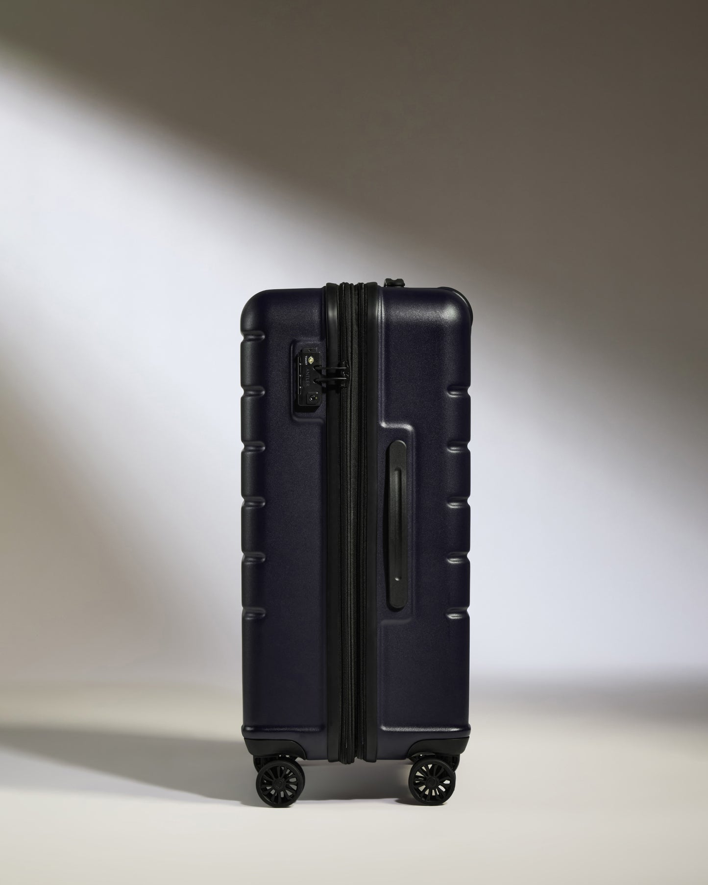 Medium Suitcase in Dark Purple - Logo