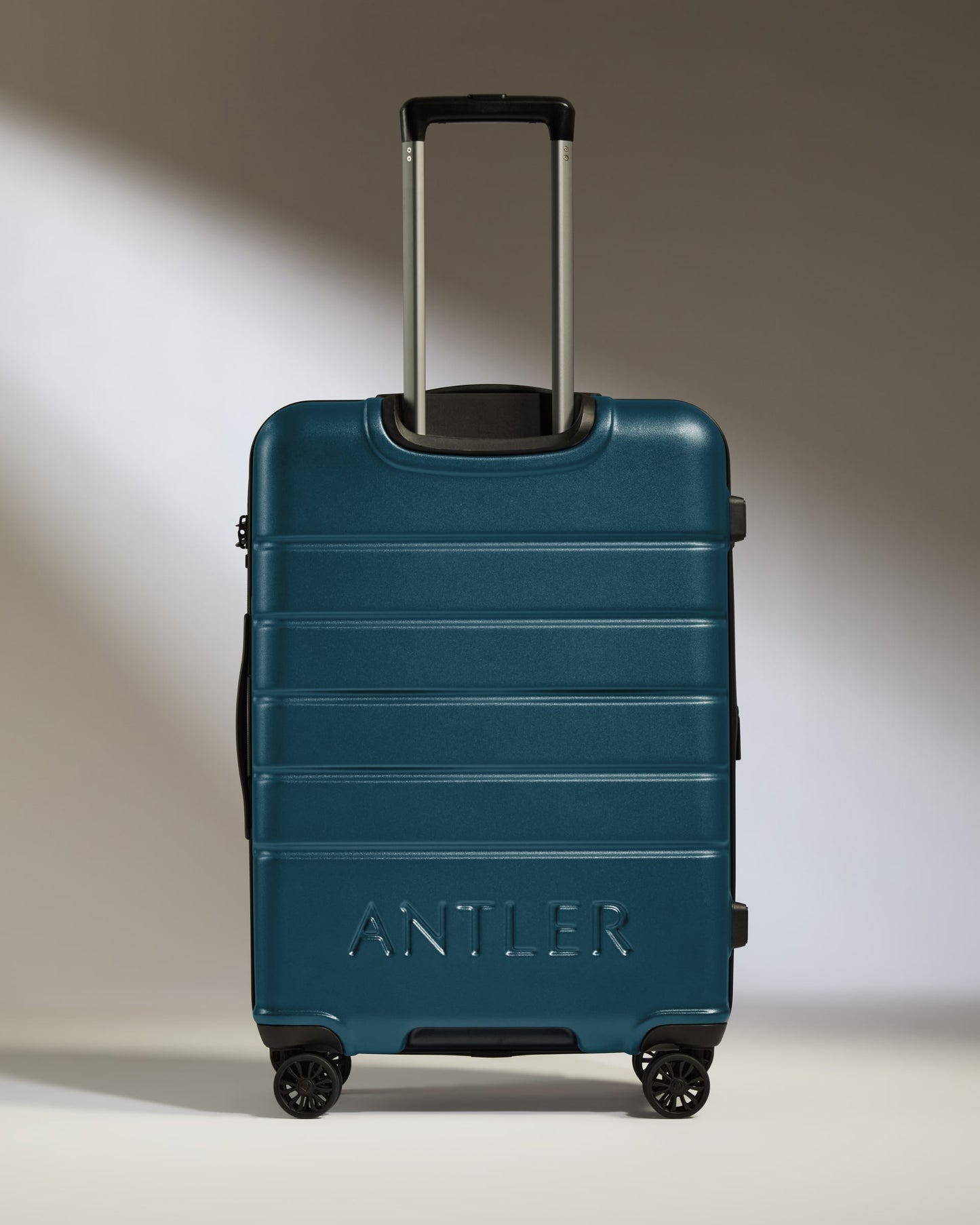 Medium Suitcase in Soft Blue - Logo