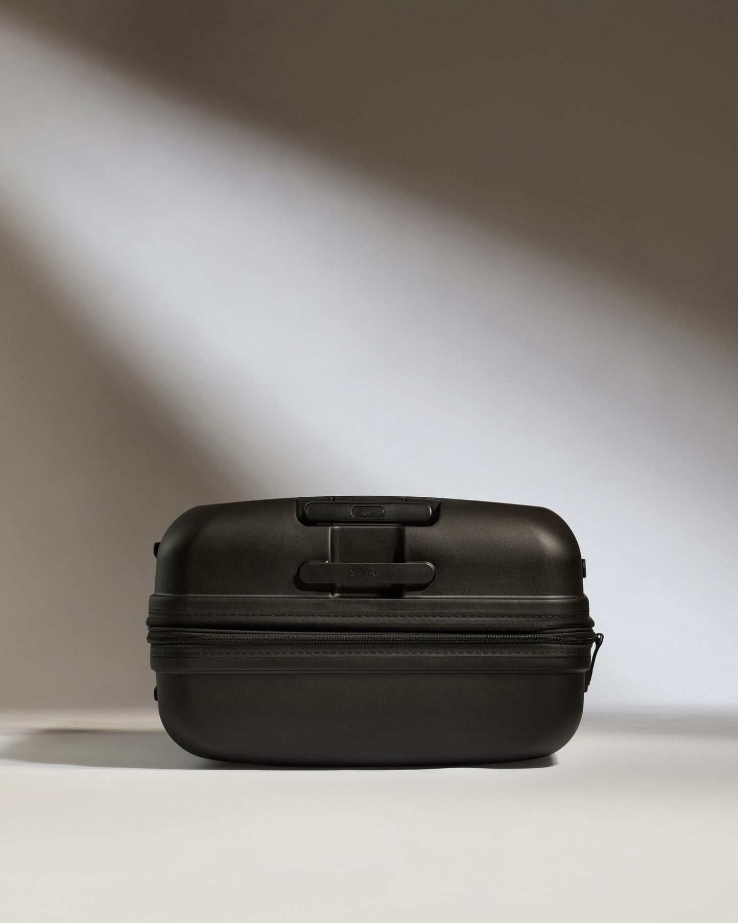 Large Suitcase in Black - Single Stripe