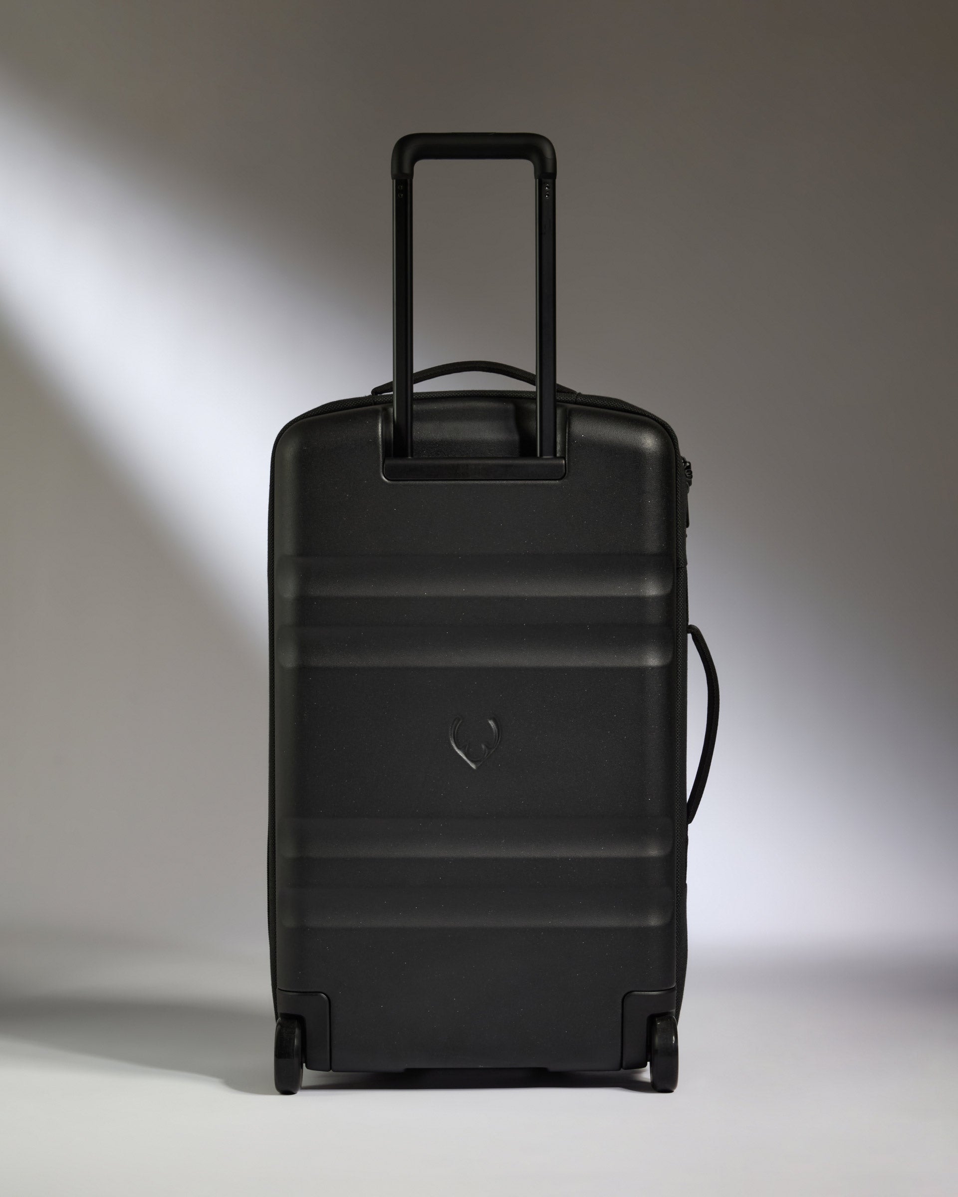 a black suitcase with handle