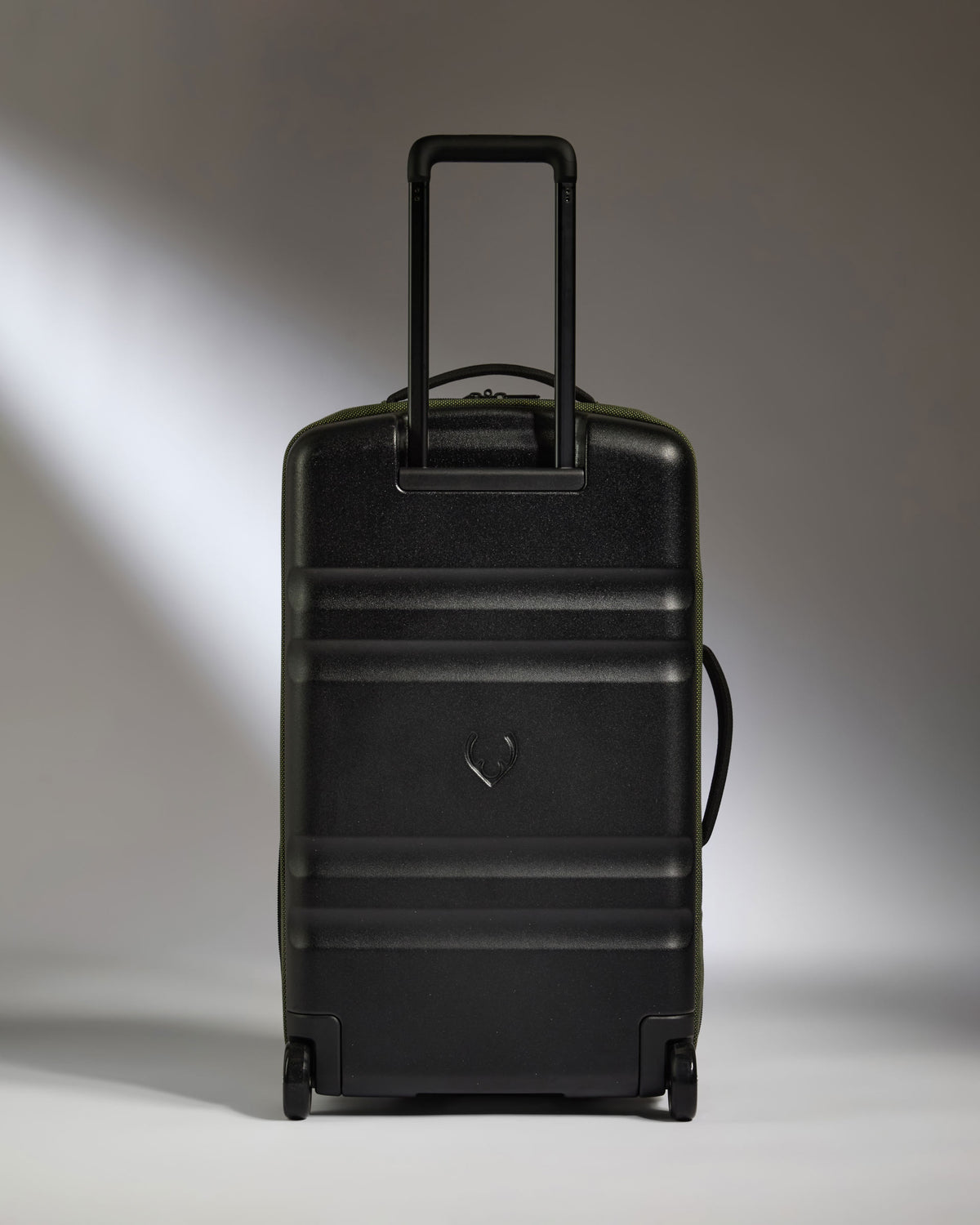 a black suitcase with a handle
