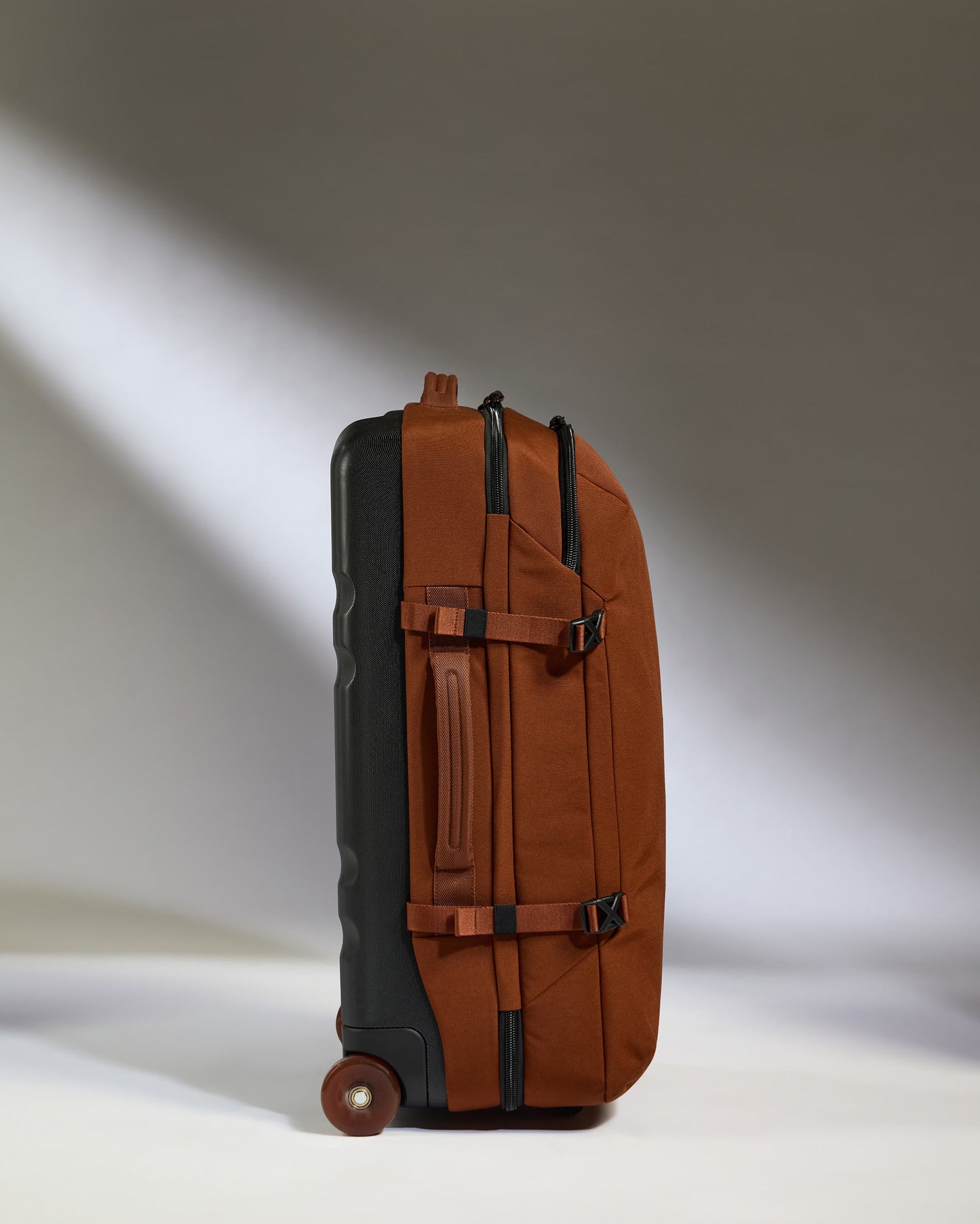 Discovery Wheeled Duffel in Clay Brown